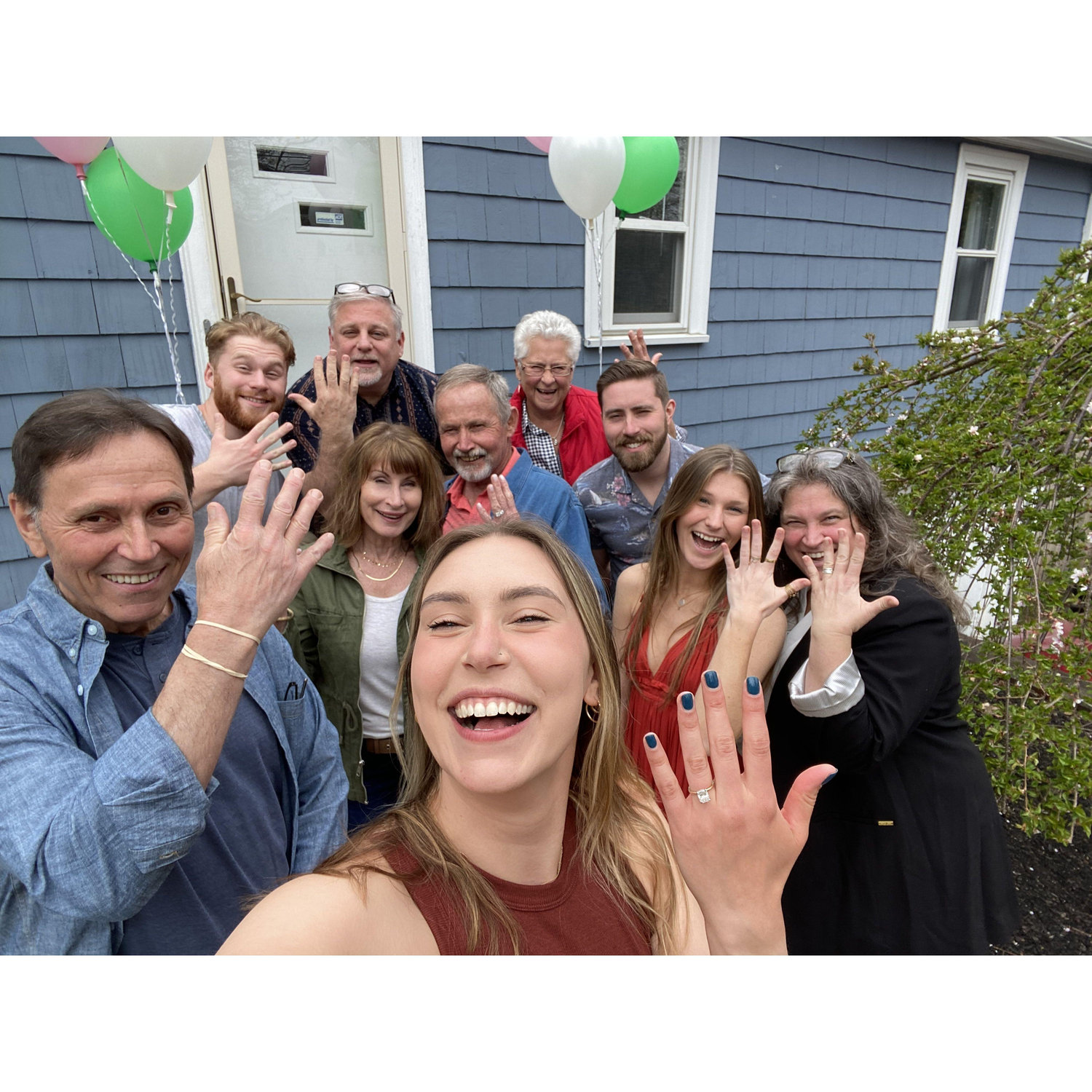 celebrating our engagement with our families at our home in Wakefield.