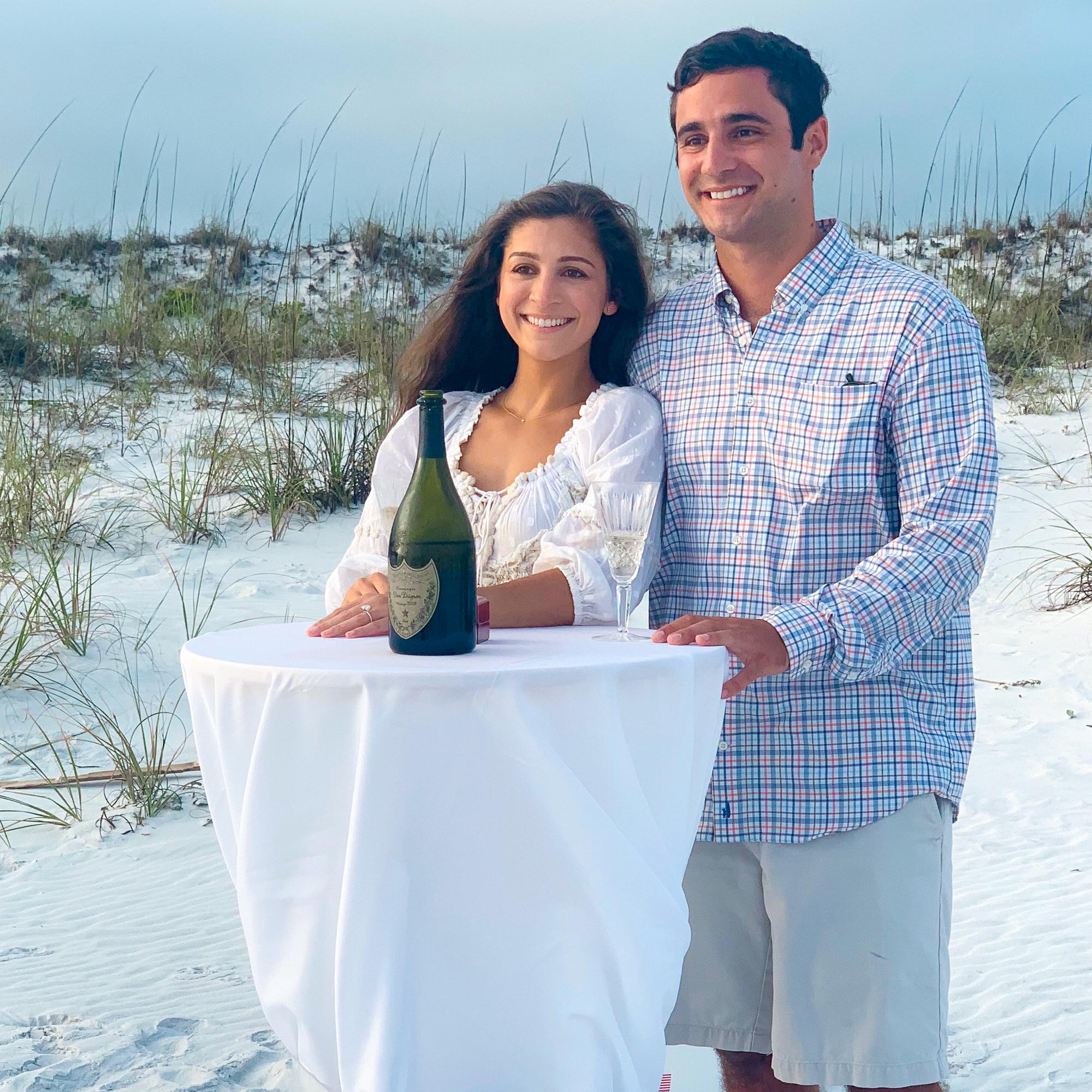 Pierce had set up this table with his parents' wedding crystal and a bottle of champagne for the most wonderful post-engagement moment.