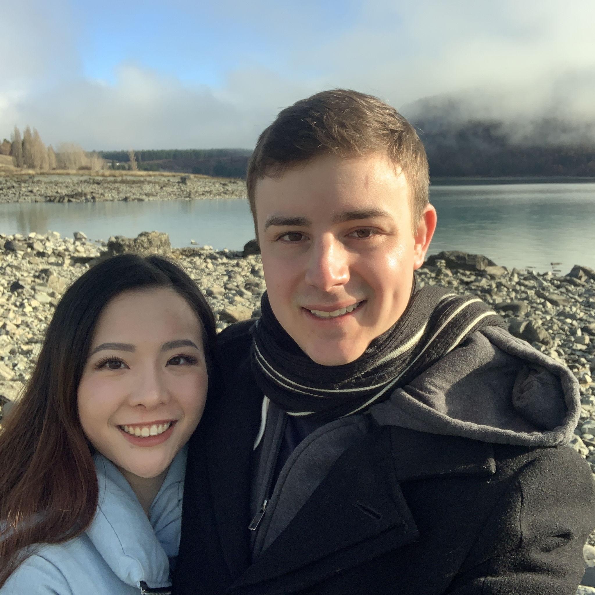 June 2021, Lake Tekapo - Andrew would carefully build a tall stack of rocks for some photos after this, which Lucia would knock over on top of him.