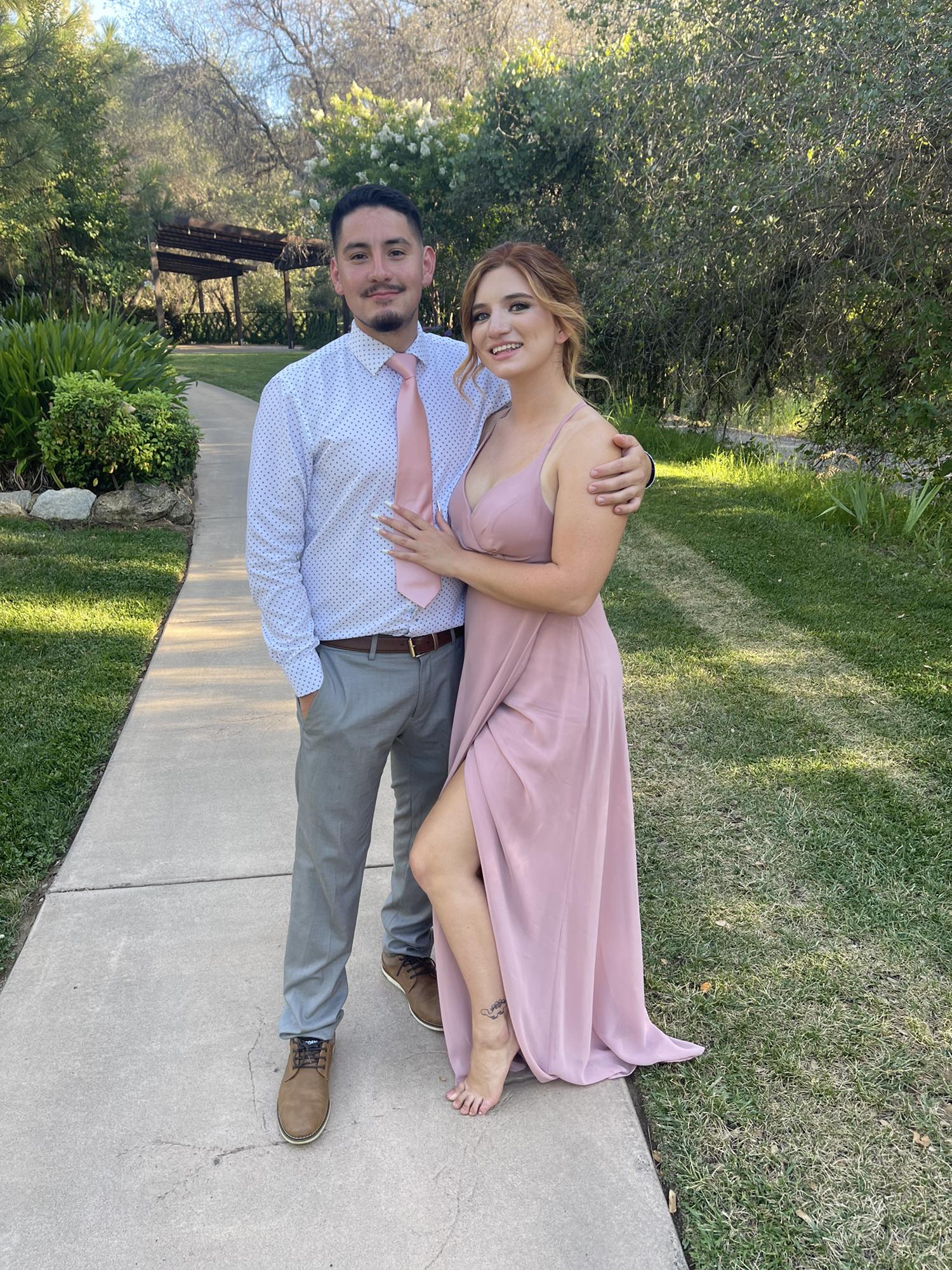 Paige was a part of her sister's wedding in June and Frankie was the perfect date!