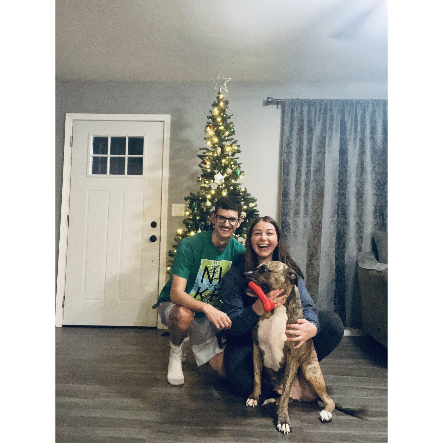 Our first Christmas in our first home! George was very excited to pose in front of our Christmas tree! 2023