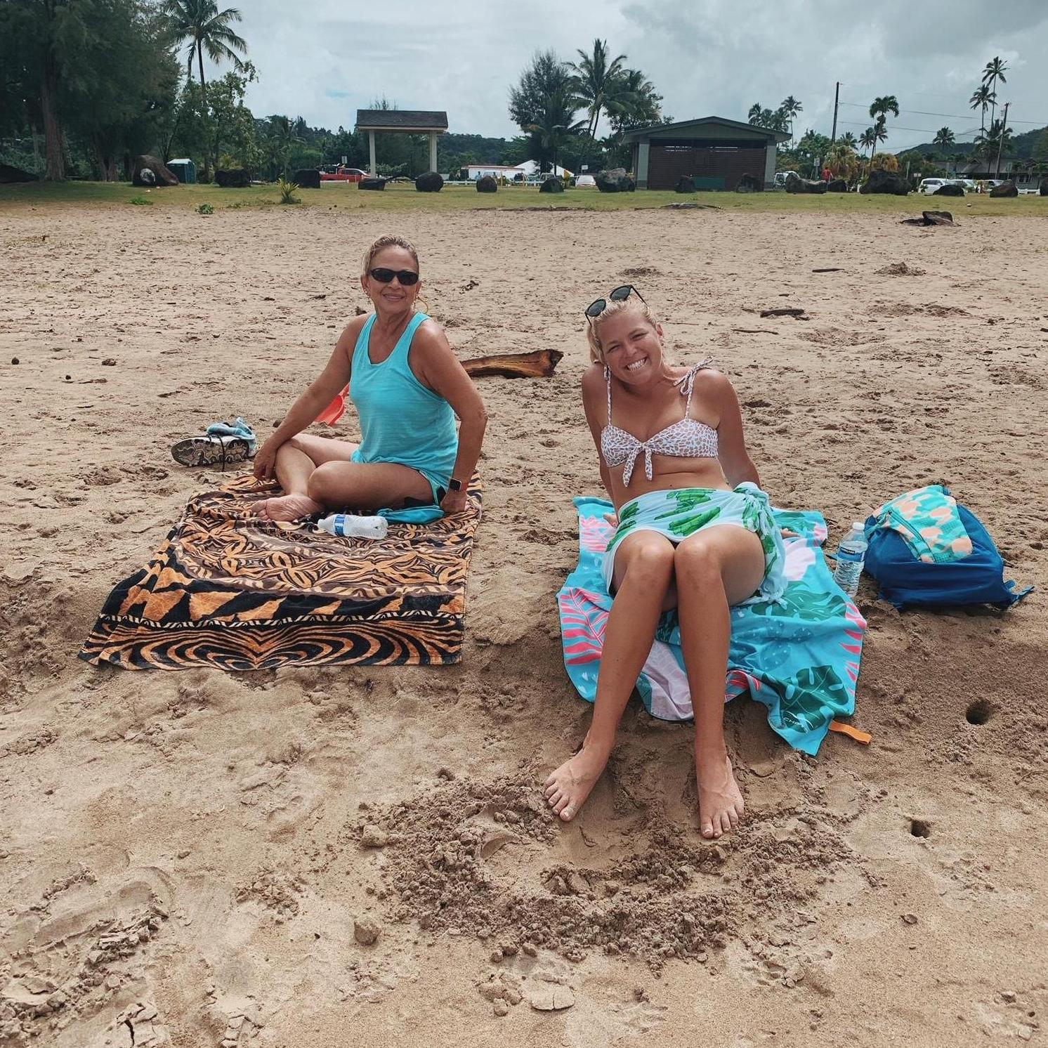 Amanda & Buddy's momma, LeeAnn, watching the boys surf!