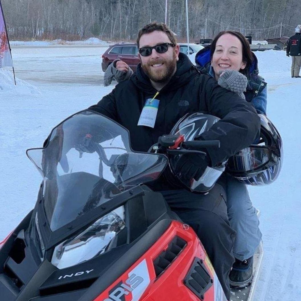 Snowmobiling in Vermont during a fun winter ski trip