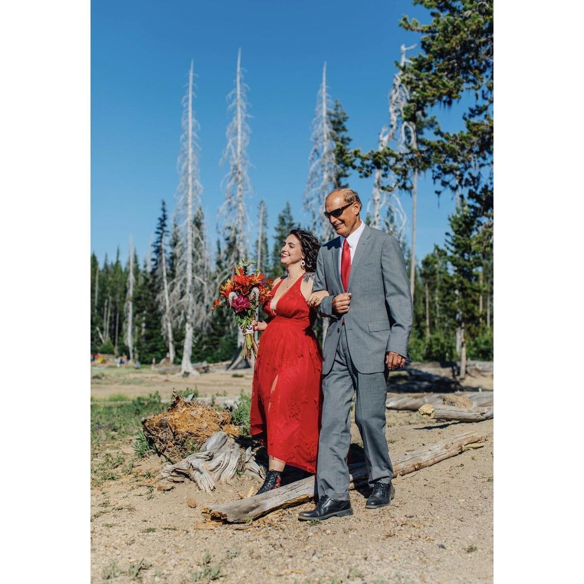 Sara & her father walking her down the "aisle."