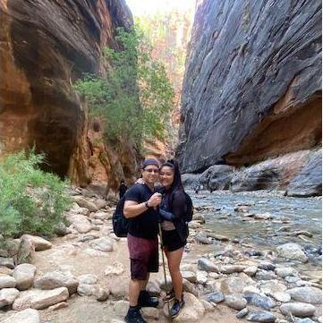 Walking and gliding through the water in the Narrows at Zion National Park, Utah! Don't forget your walking stick!