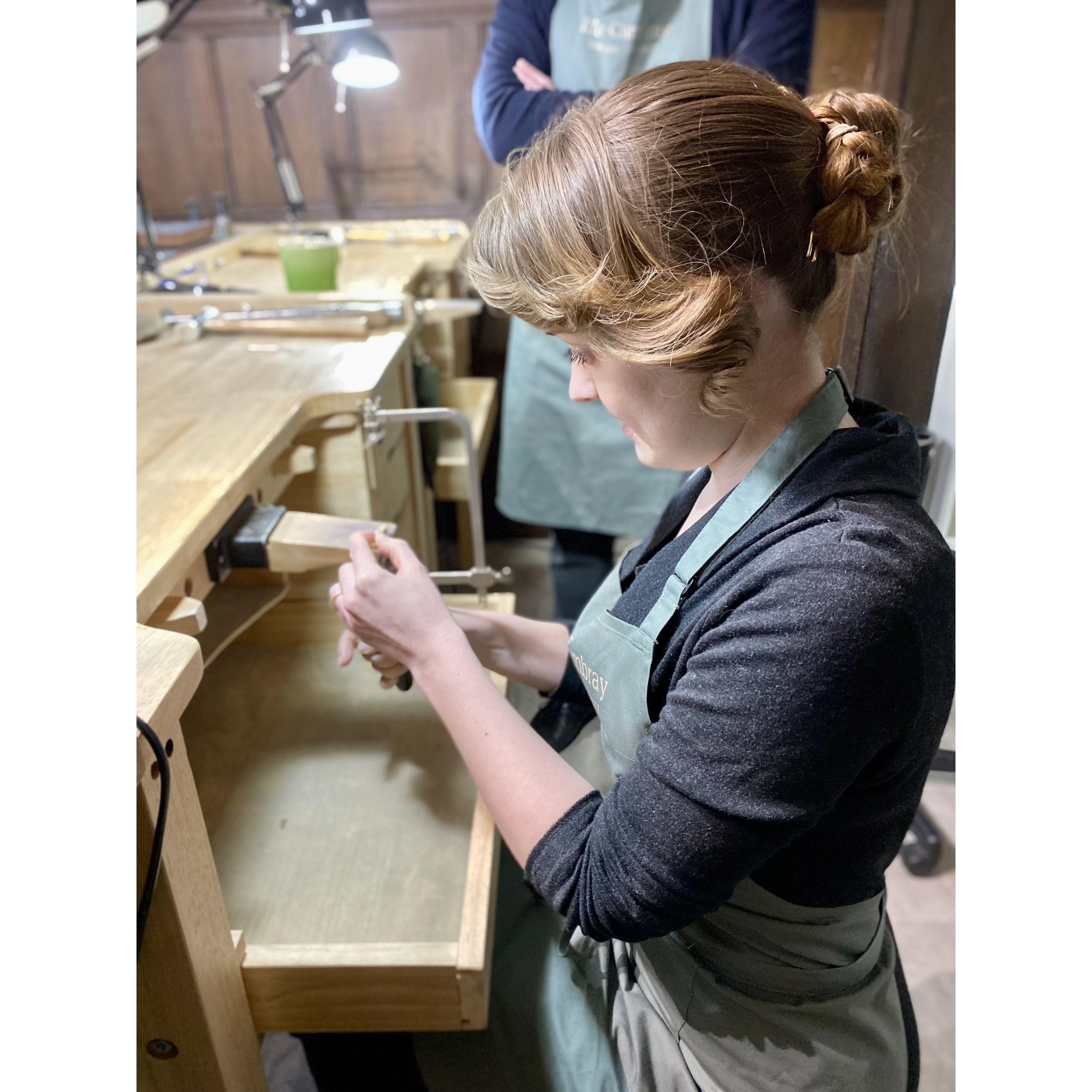 Gwen crafting her future husband's ring.