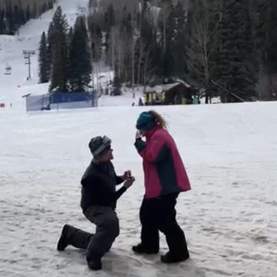 Zak proposed at the base of Purgatory Mountain in Colorado. Easiest "YES" ever!