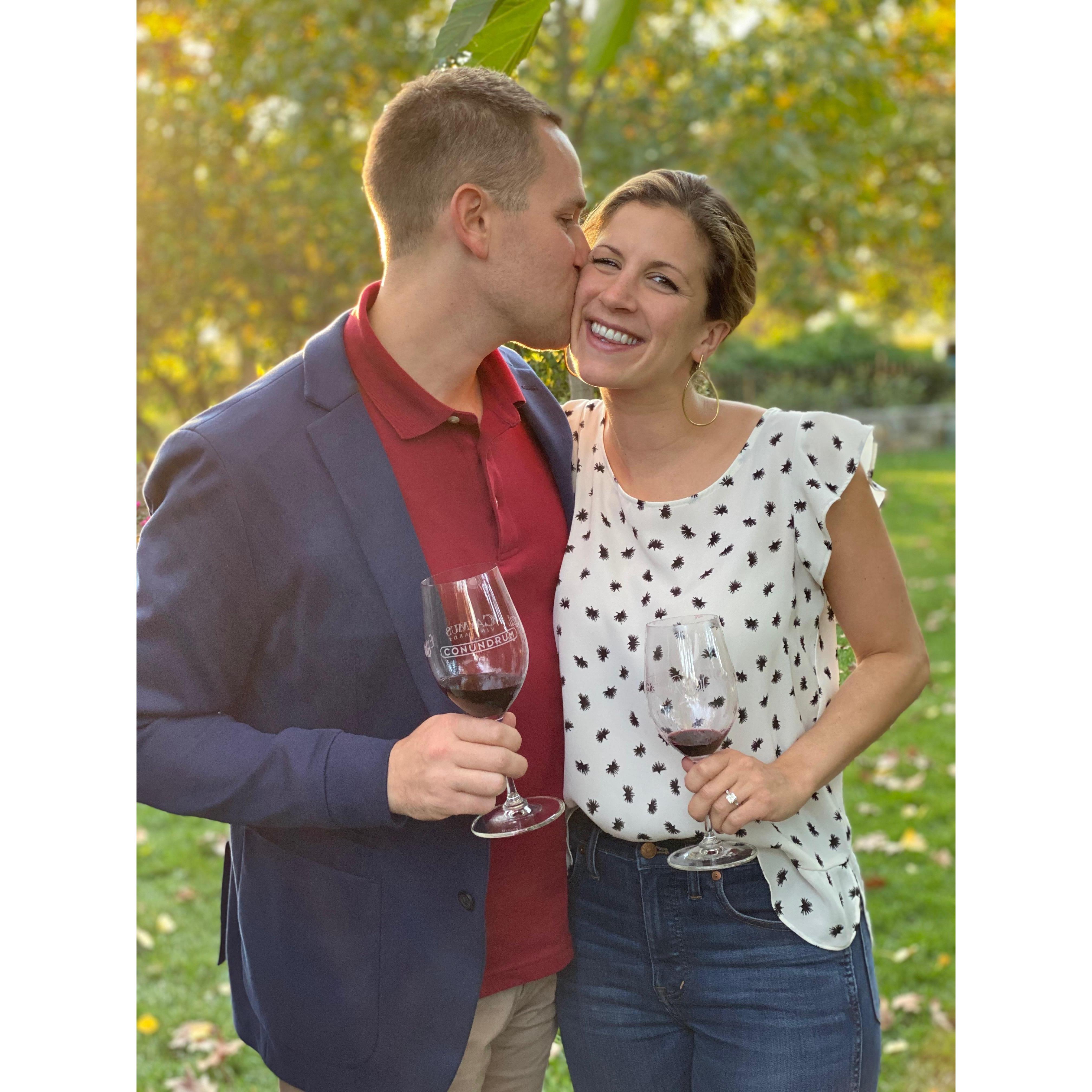 Celebrating our engagement with lots of wine!