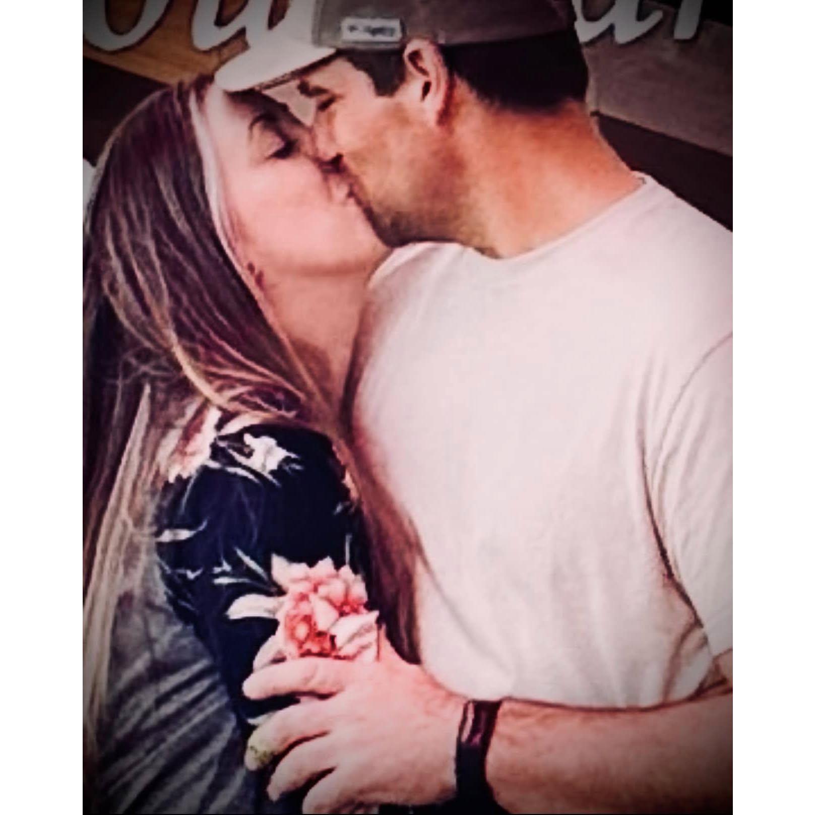 This was taken at the venue they are getting married at, Butler's Courtyard, the day Kathryn and Aaron decided they wanted to get married there. All of these photos lead us to now.