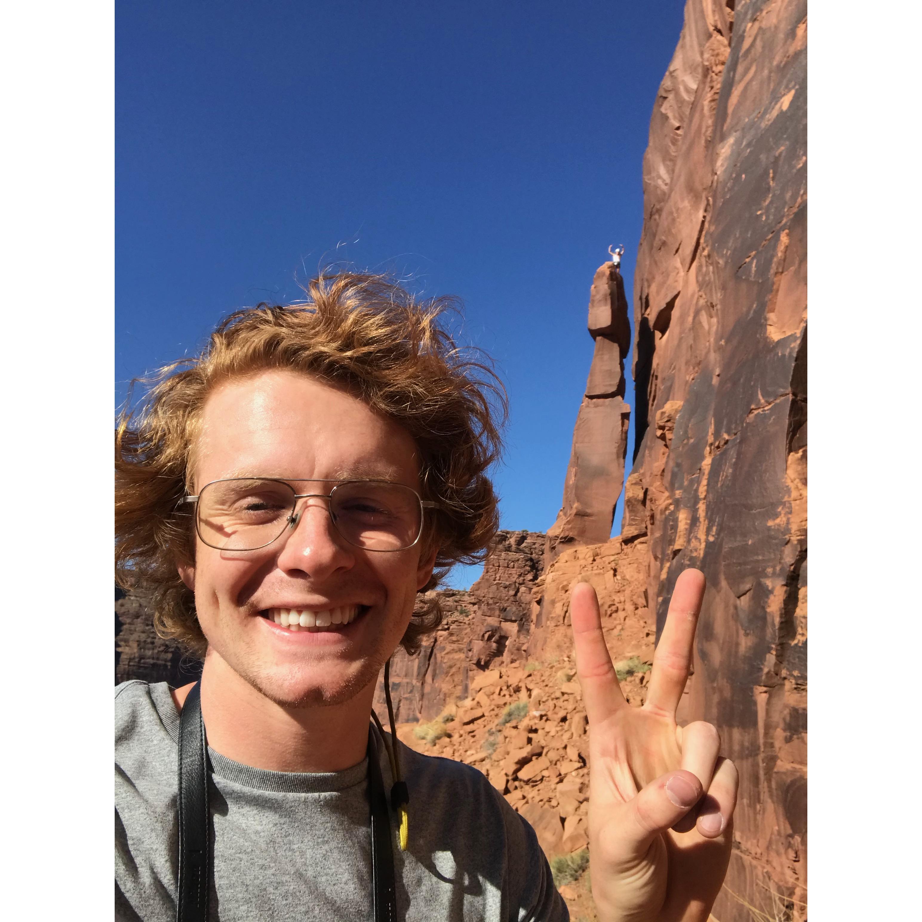 Climbing a tower in Moab