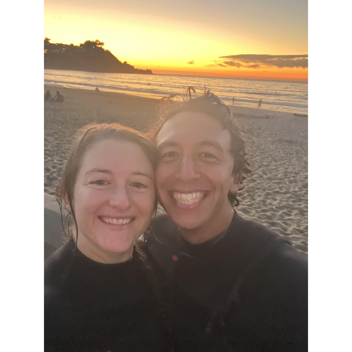 Surfing at sunset | California