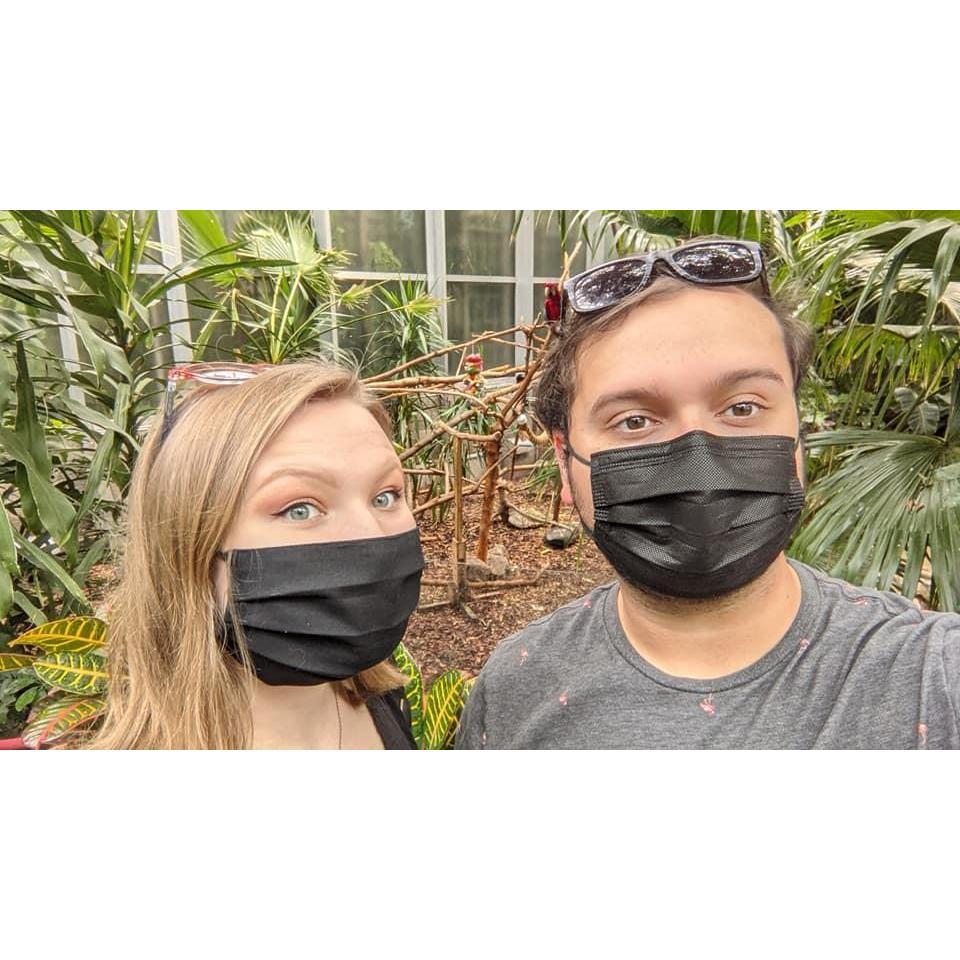 a trip to the detroit zoo! had to take a picture with the parrot.
