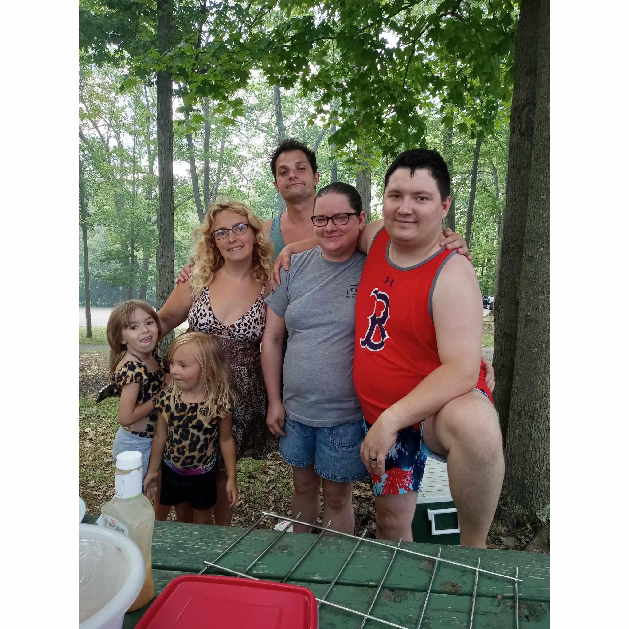 This is one of our trips to Highland Park. On this day Tyler & I invited a few friends to come enjoy some summer fun. This photo is of Tyler's cousin, her fiancé, & her daughters.