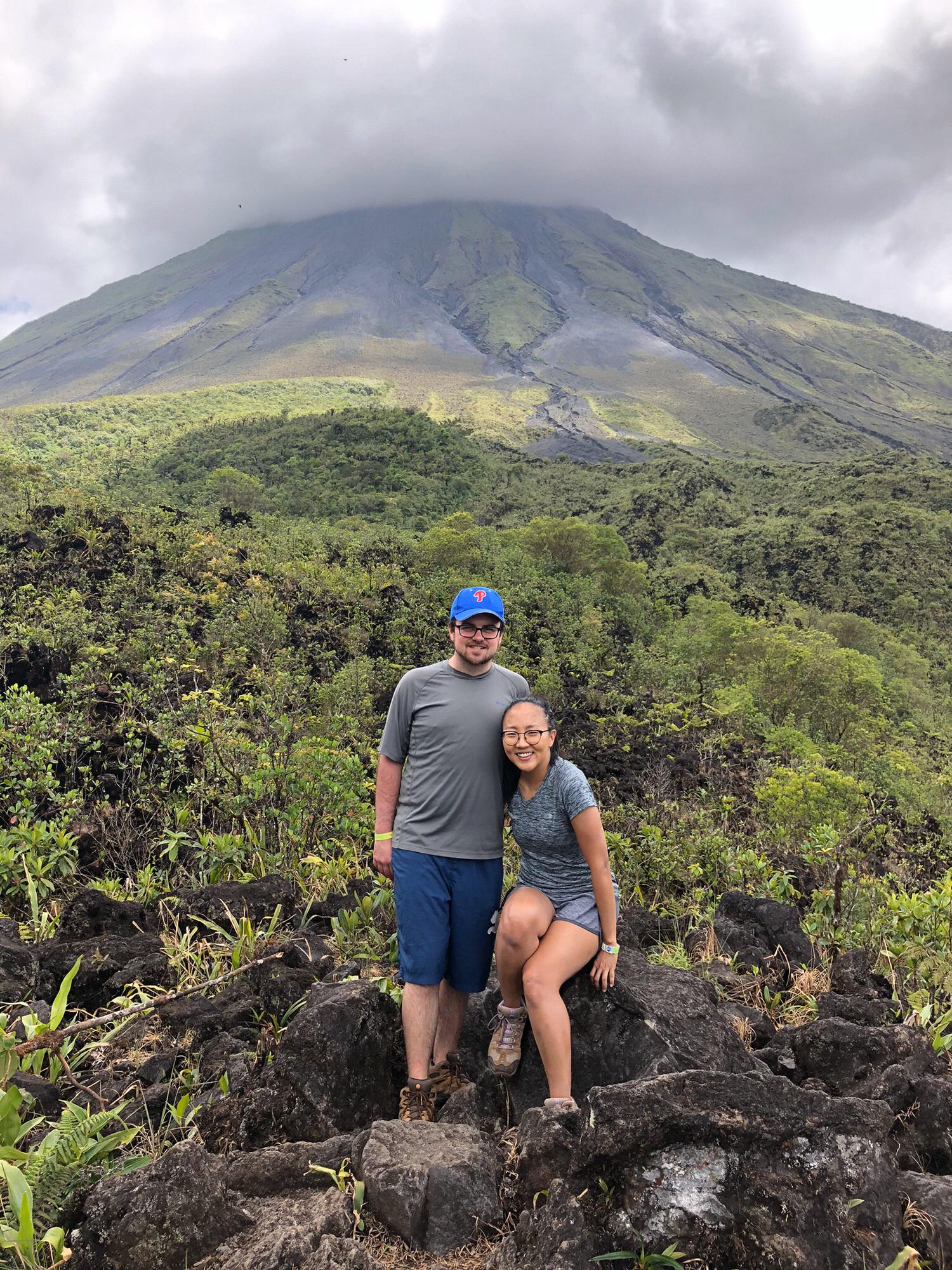 Hiking Arenal National Park in Costa Rica with an active volcano in the background! March, 2019.