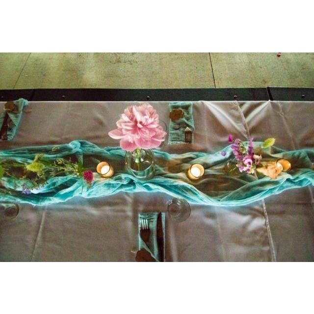 Sarah handiwork with dyed cheesecloth for the table runner and napkins