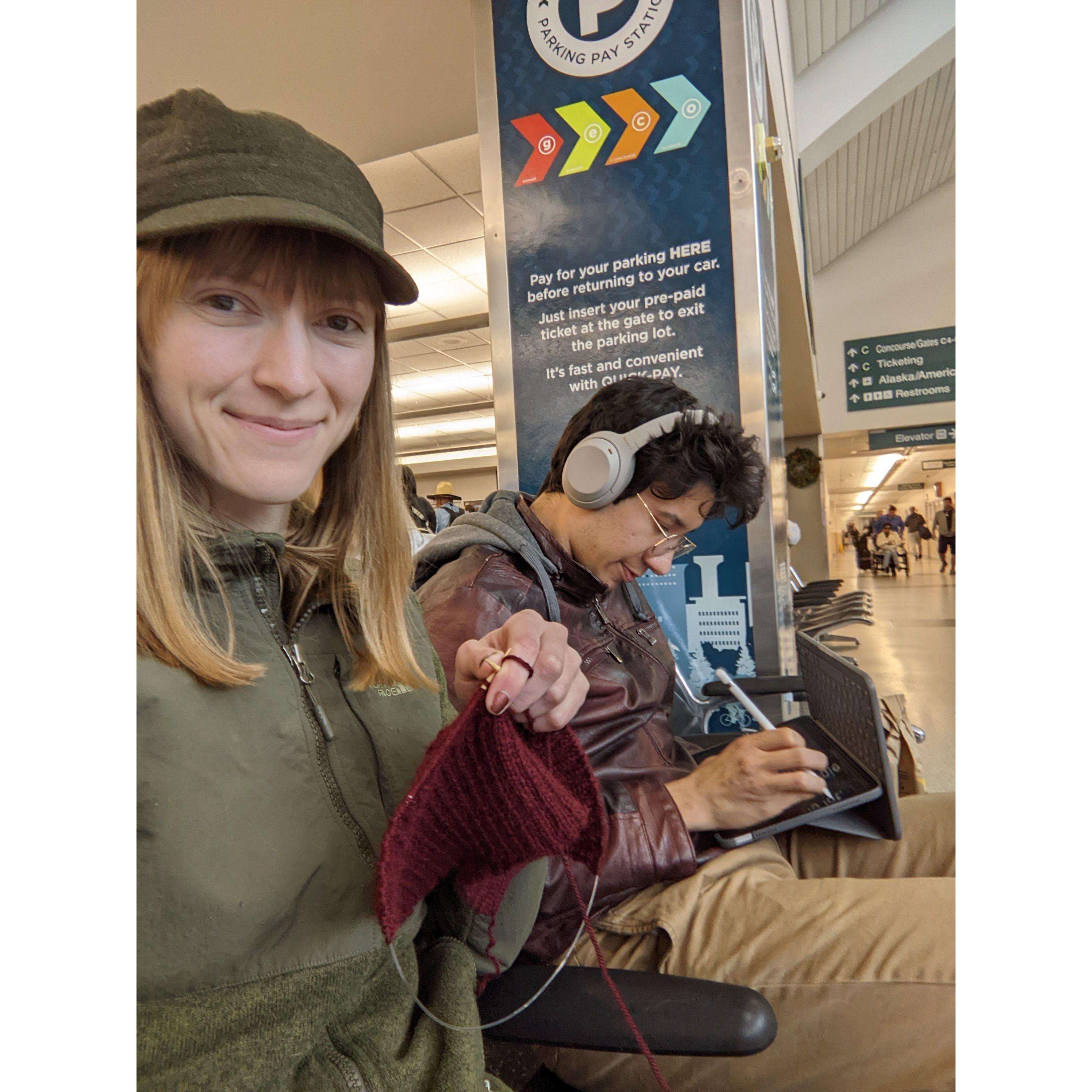 He's studying, she's knitting.. Another airport drop off with long distance