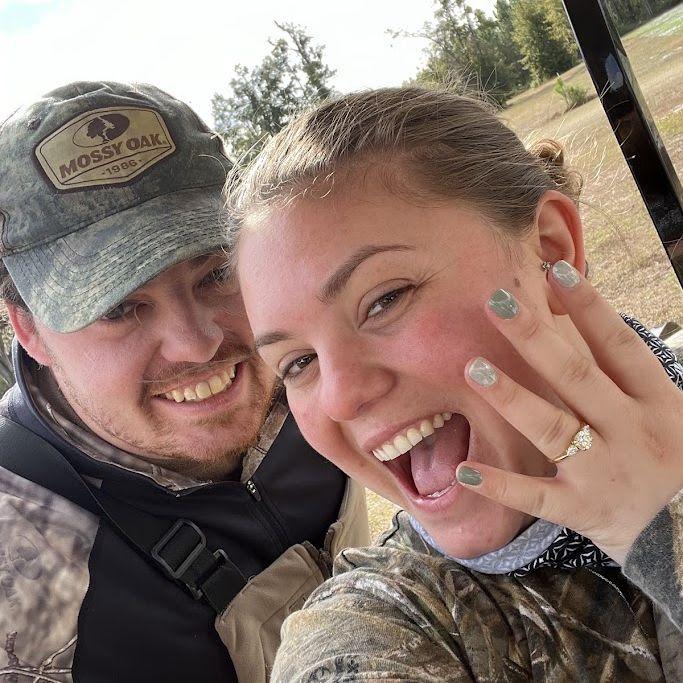 The day after Kelsey said "YES" and moments after killing her first deer!