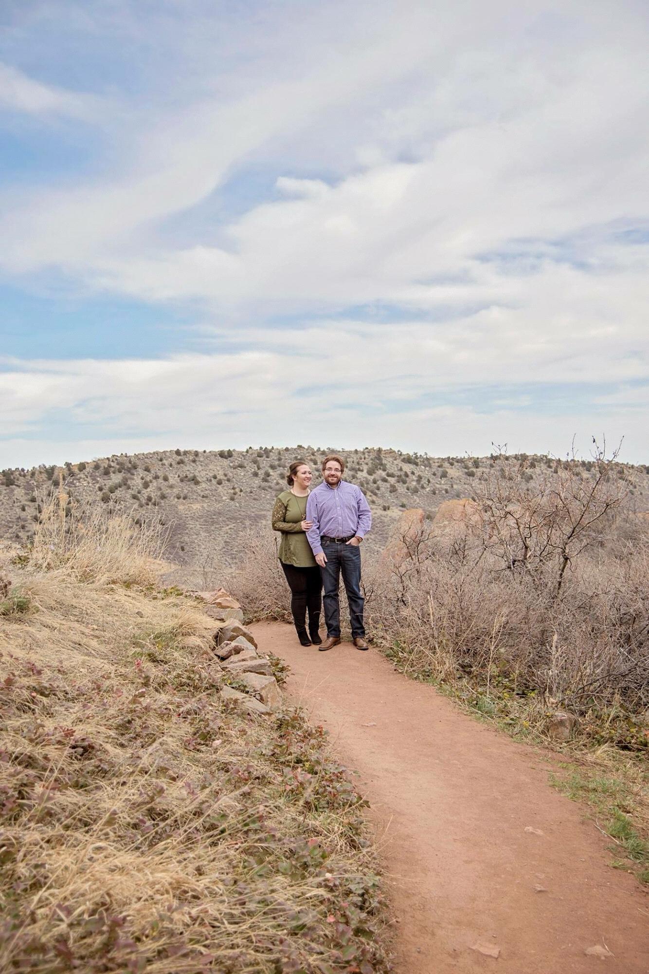 Engagement photos at Red Rocks courtesy of Becca Romine with Feathered Penny Photography