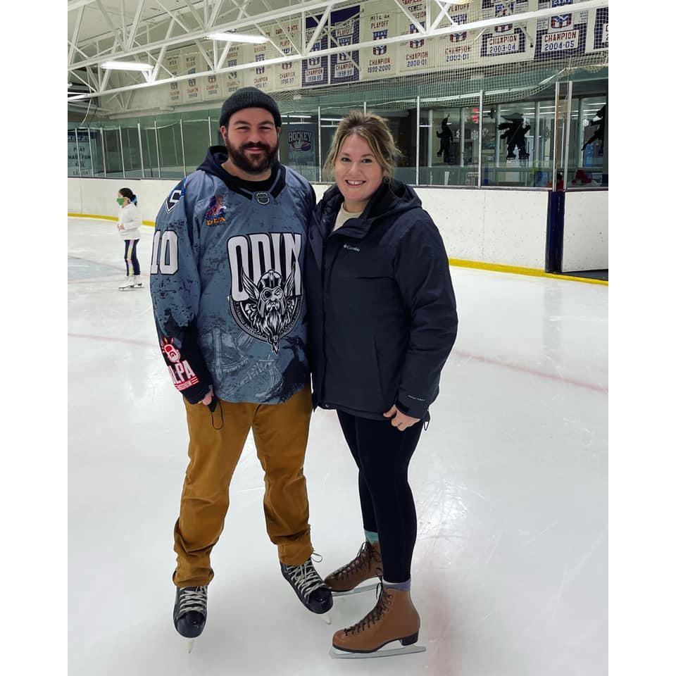 Van teaching Jessie how to ice skate.
