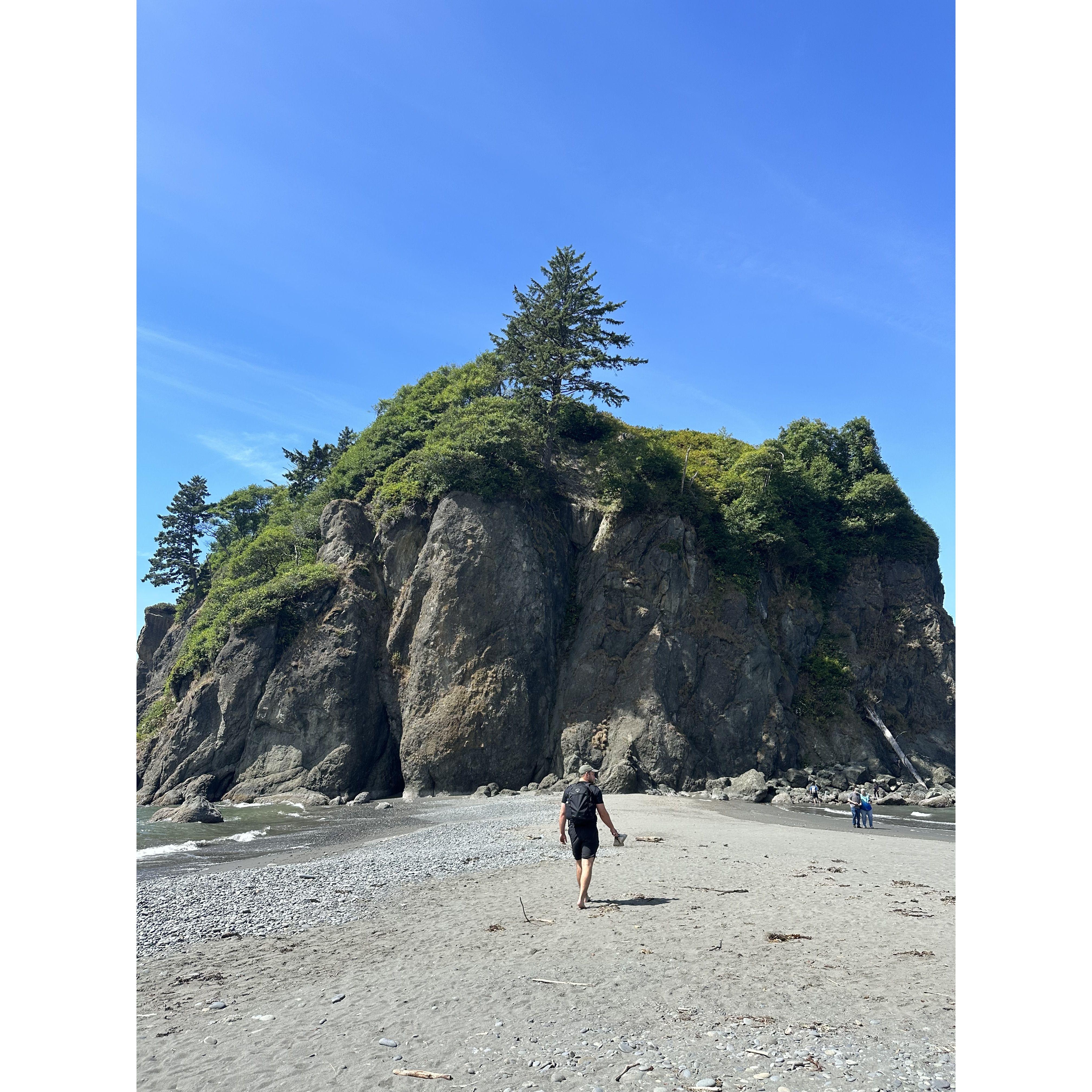 This photo, from our second trip together, is of Jacob walking on the beach in Olympic National Park!