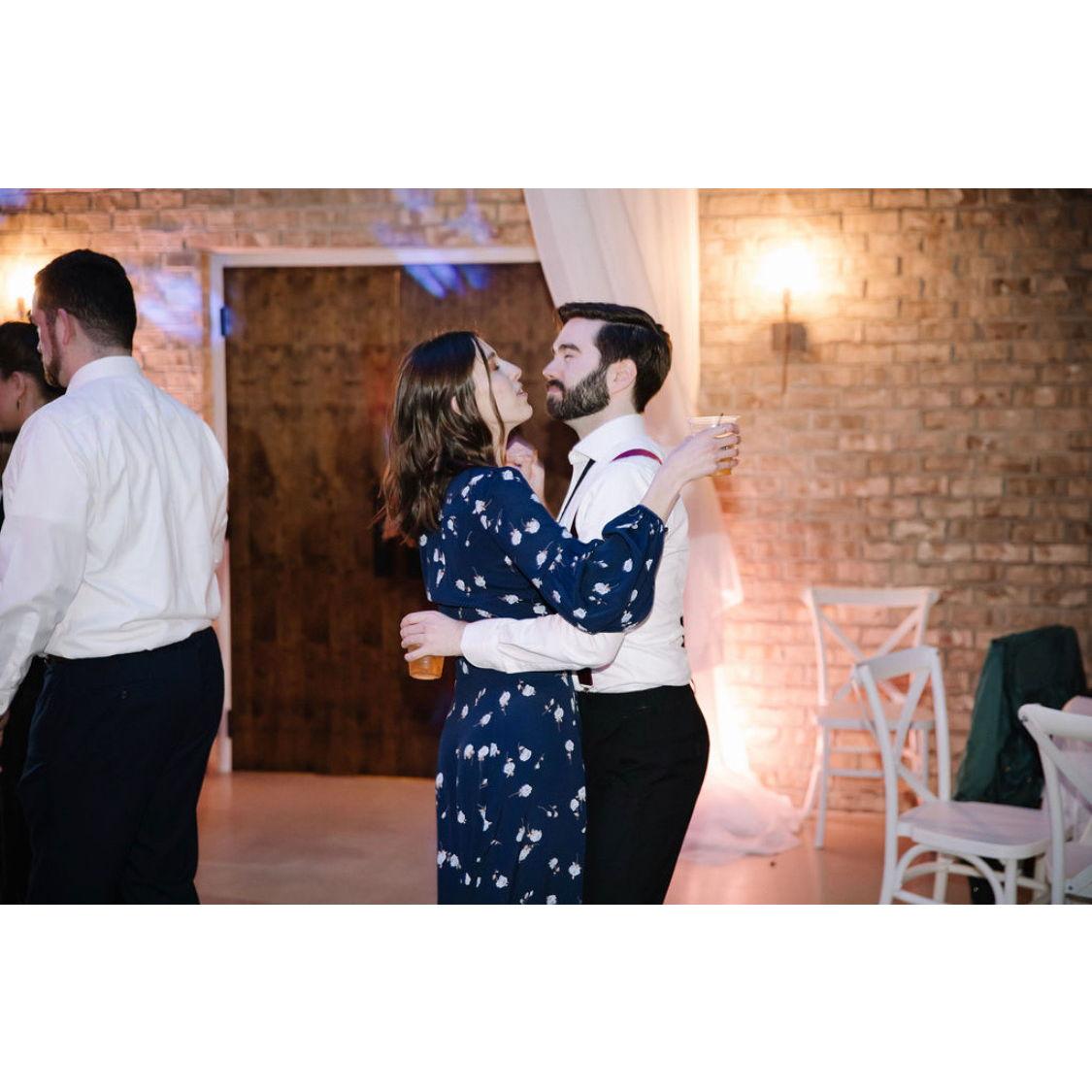 Caught doing what we love to do— dance at weddings! (Taken at Groomswoman Emily's wedding— the first wedding we attended together)