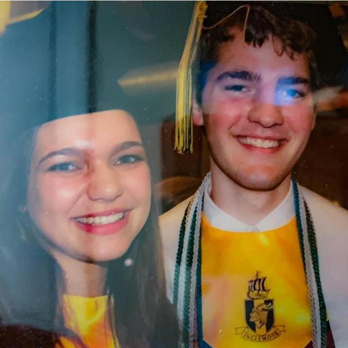 Our first photo together, high school graduation, 2011.