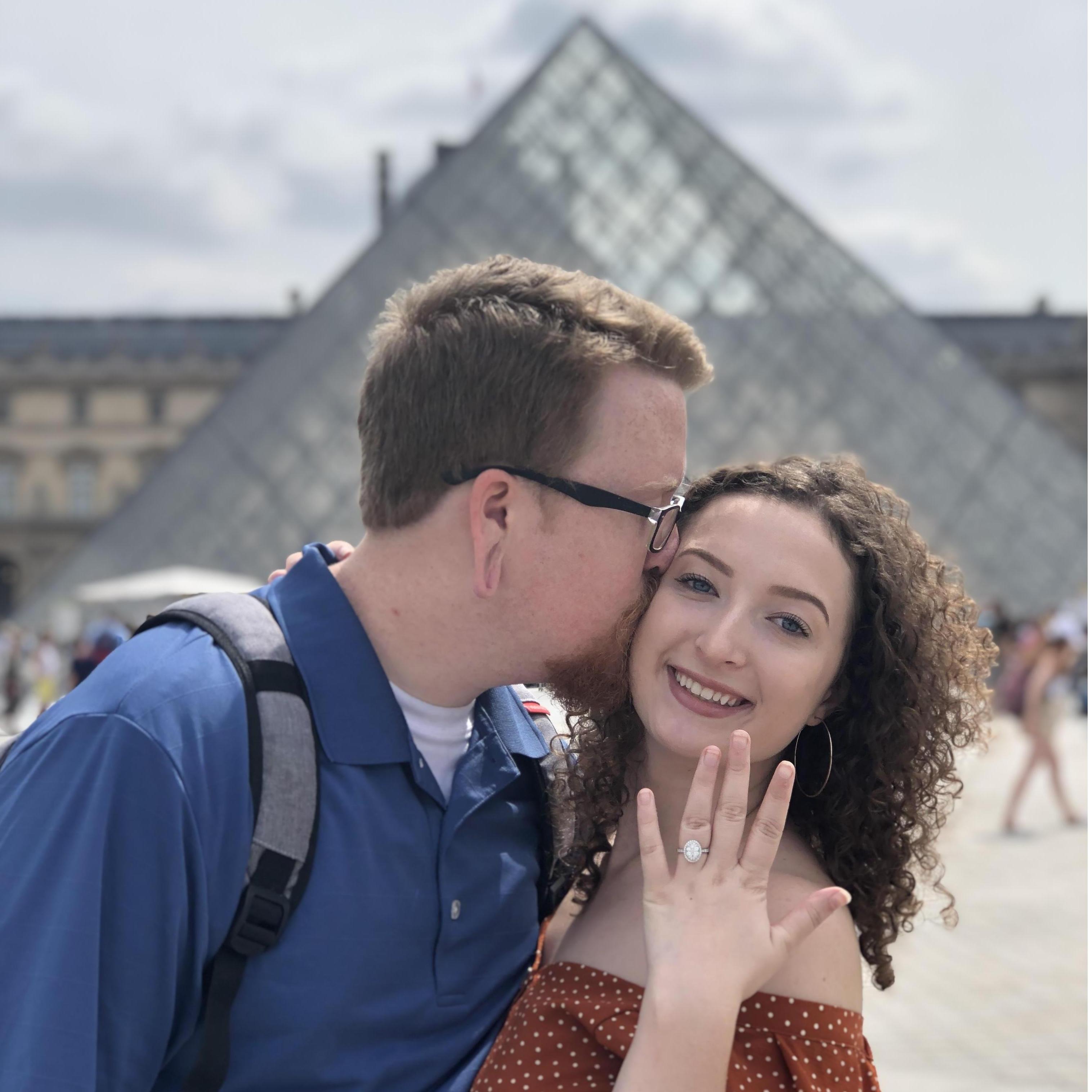 This is the day after Will proposed, and they were obviously still excited in front of the Louvre.