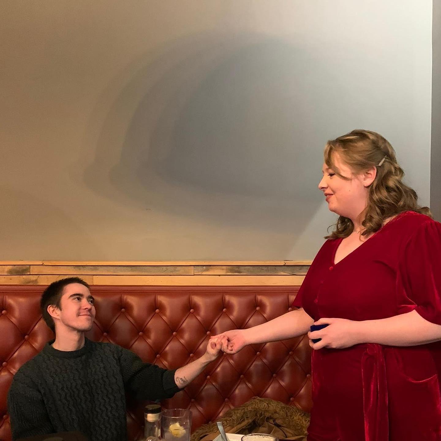EQ: Erin and I planned a joint proposal at the Meijer Gardens in December 2022. But an unexpected  emergency derailed our plans. So instead, I proposed that night at dinner with the Paskus's!