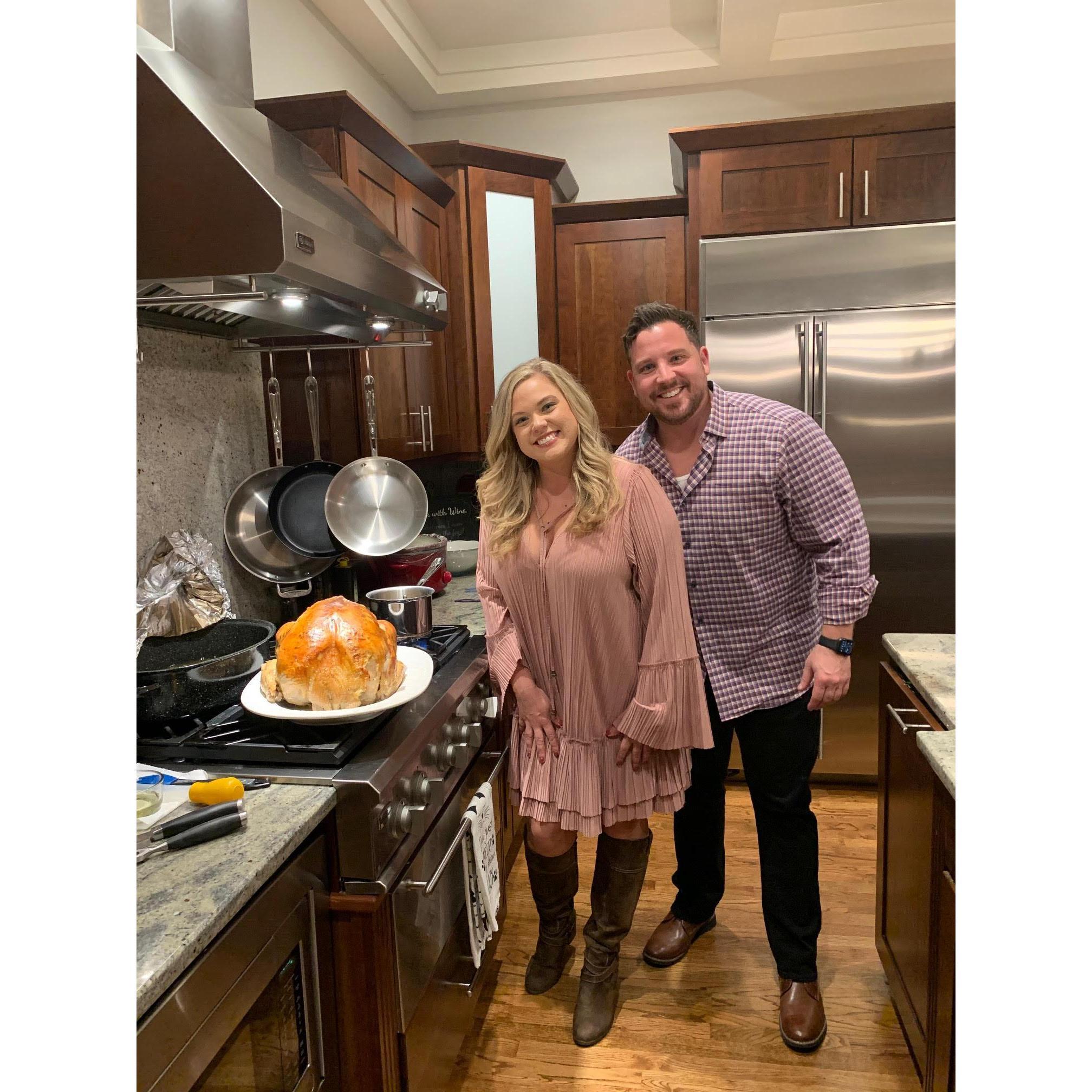 Alex and Ryan's first turkey together when they hosted Friendsgiving!