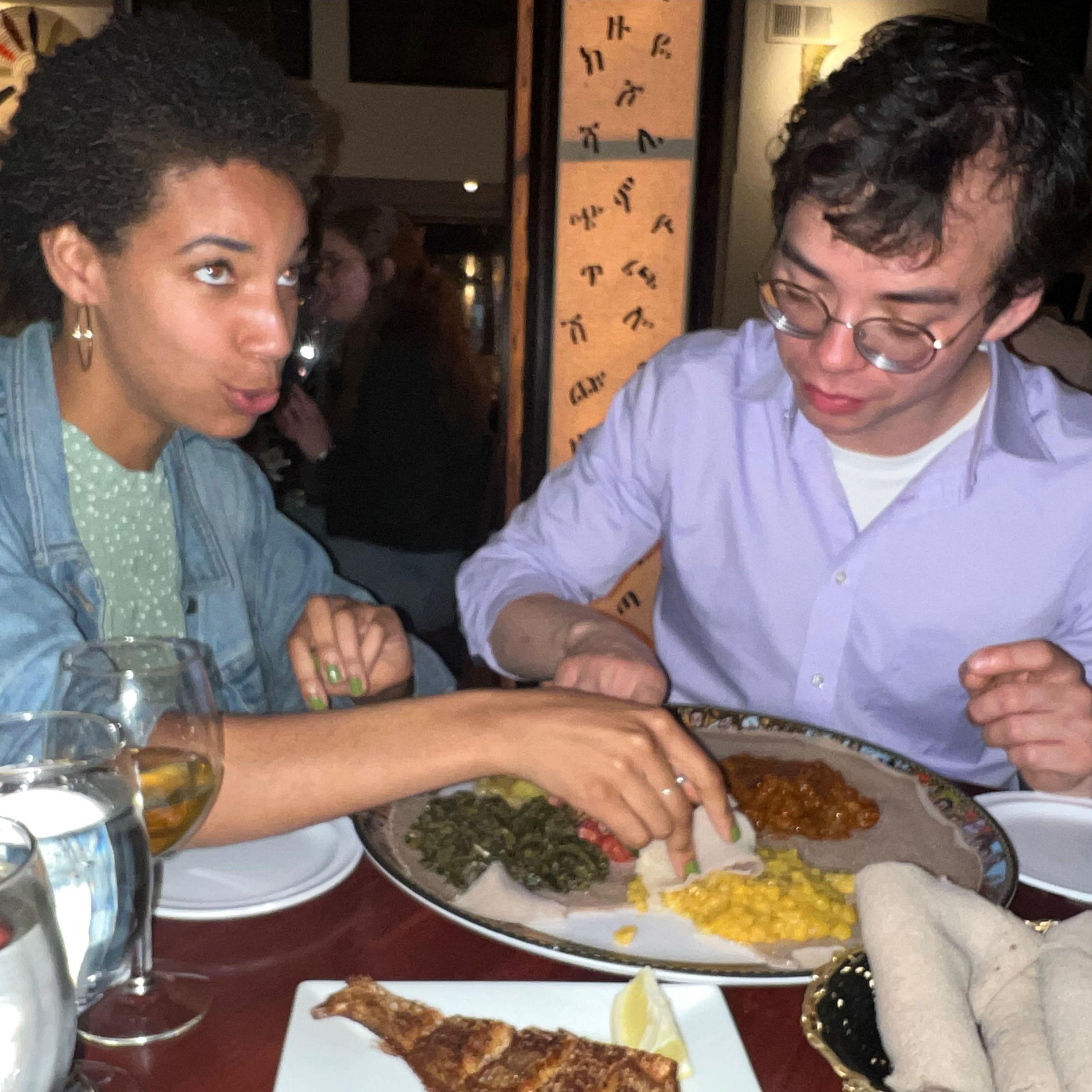 Chowing down on some injera at one of our favorite restaurants in Washington DC, Ethiopic!