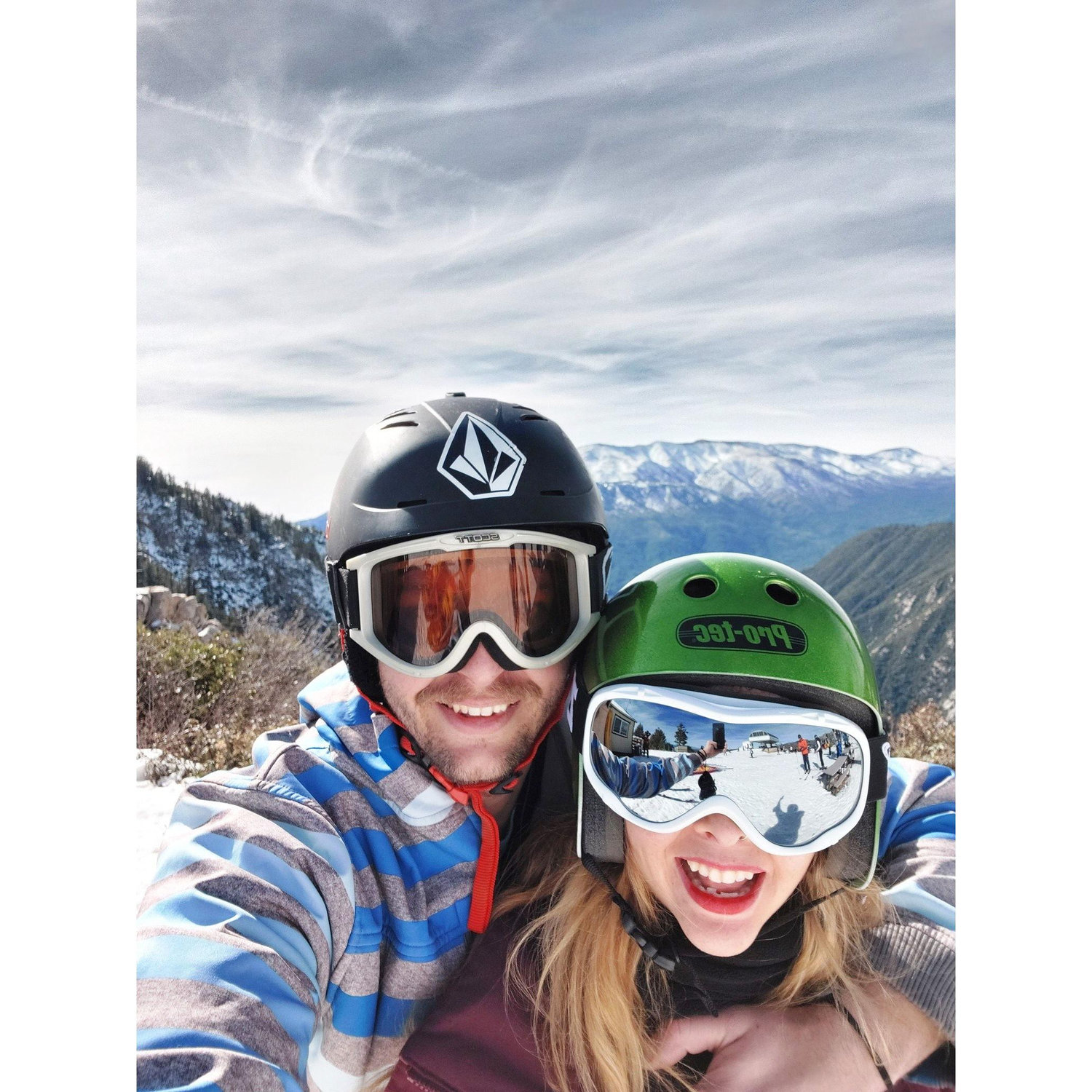 We love snowboarding! We got engaged on a mountain!