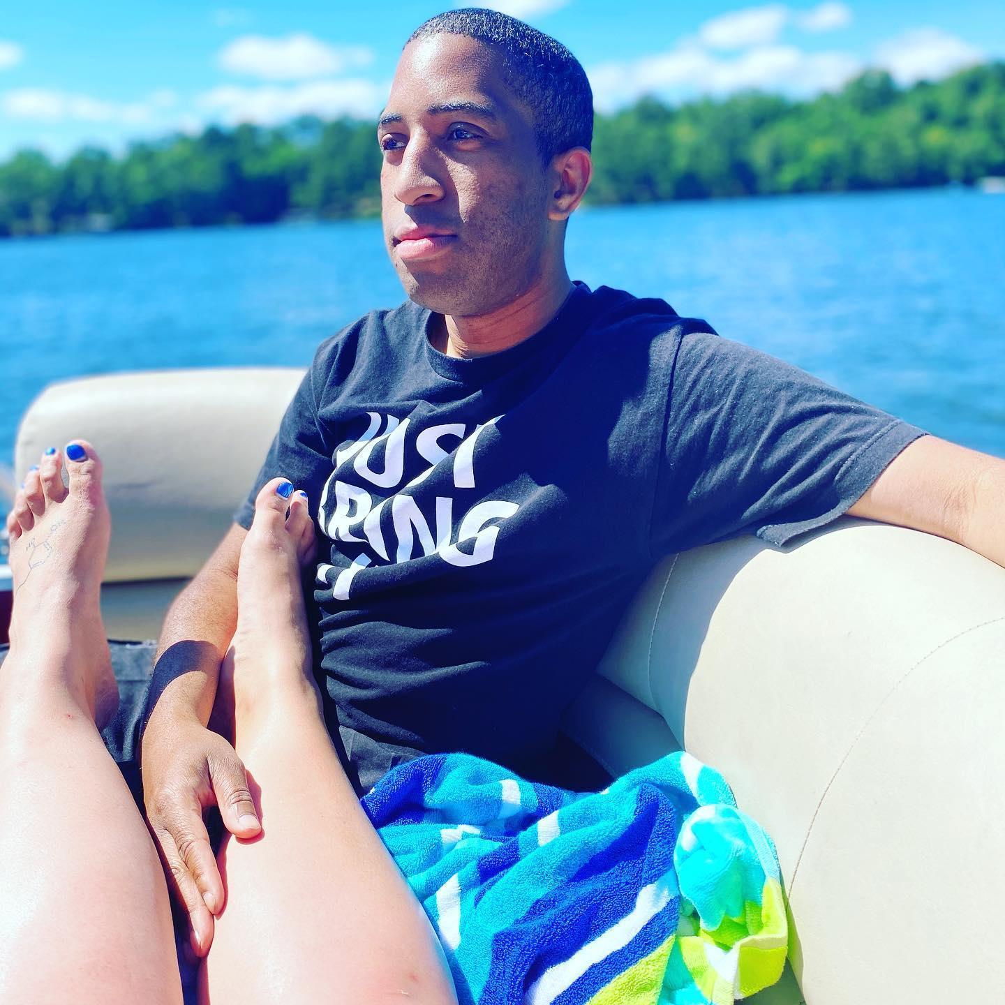 An activity that the couple loves to do together is to be near water or on water.