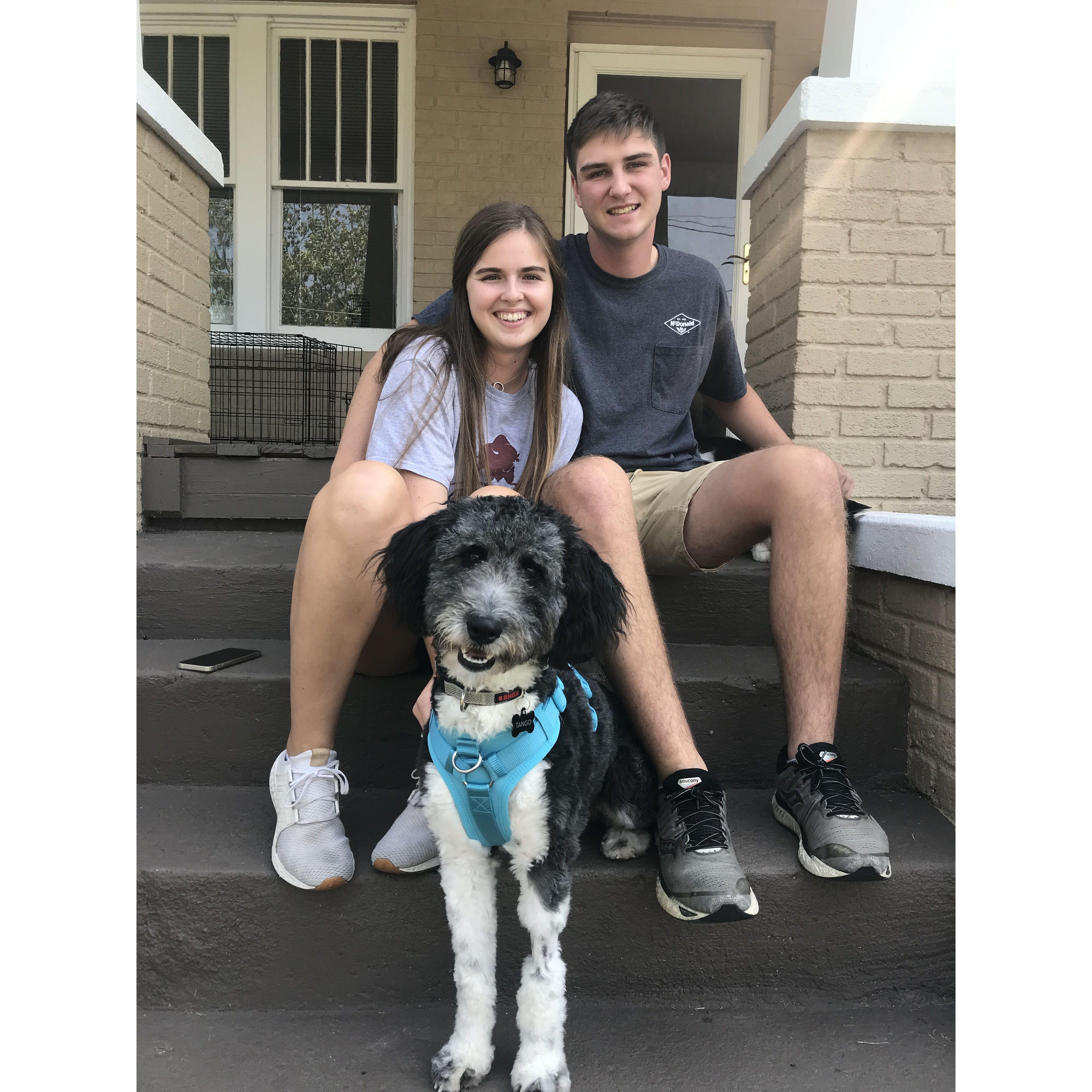 Us and our dog Tango in front of the first house we lived in together.