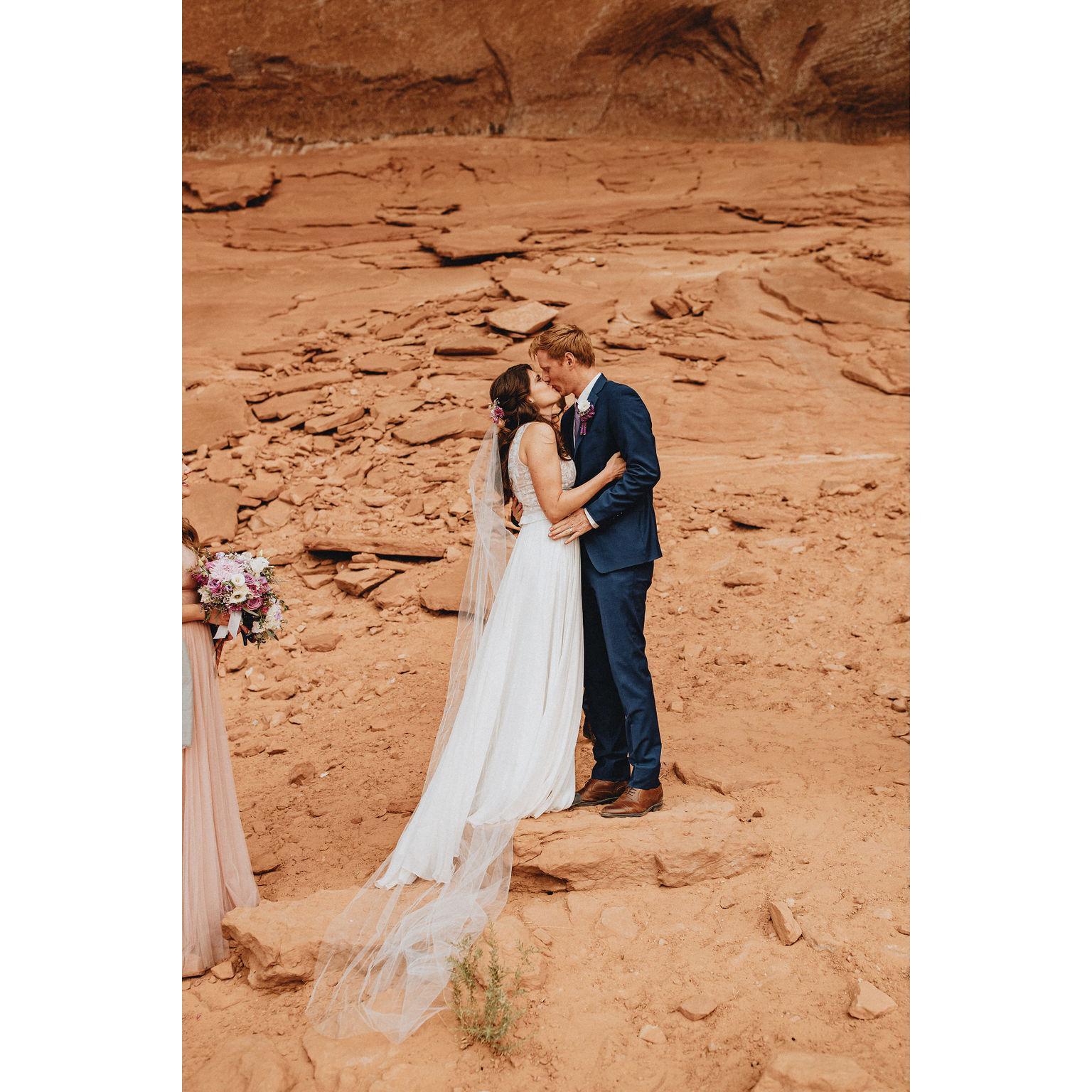 First kiss as husband and wife.