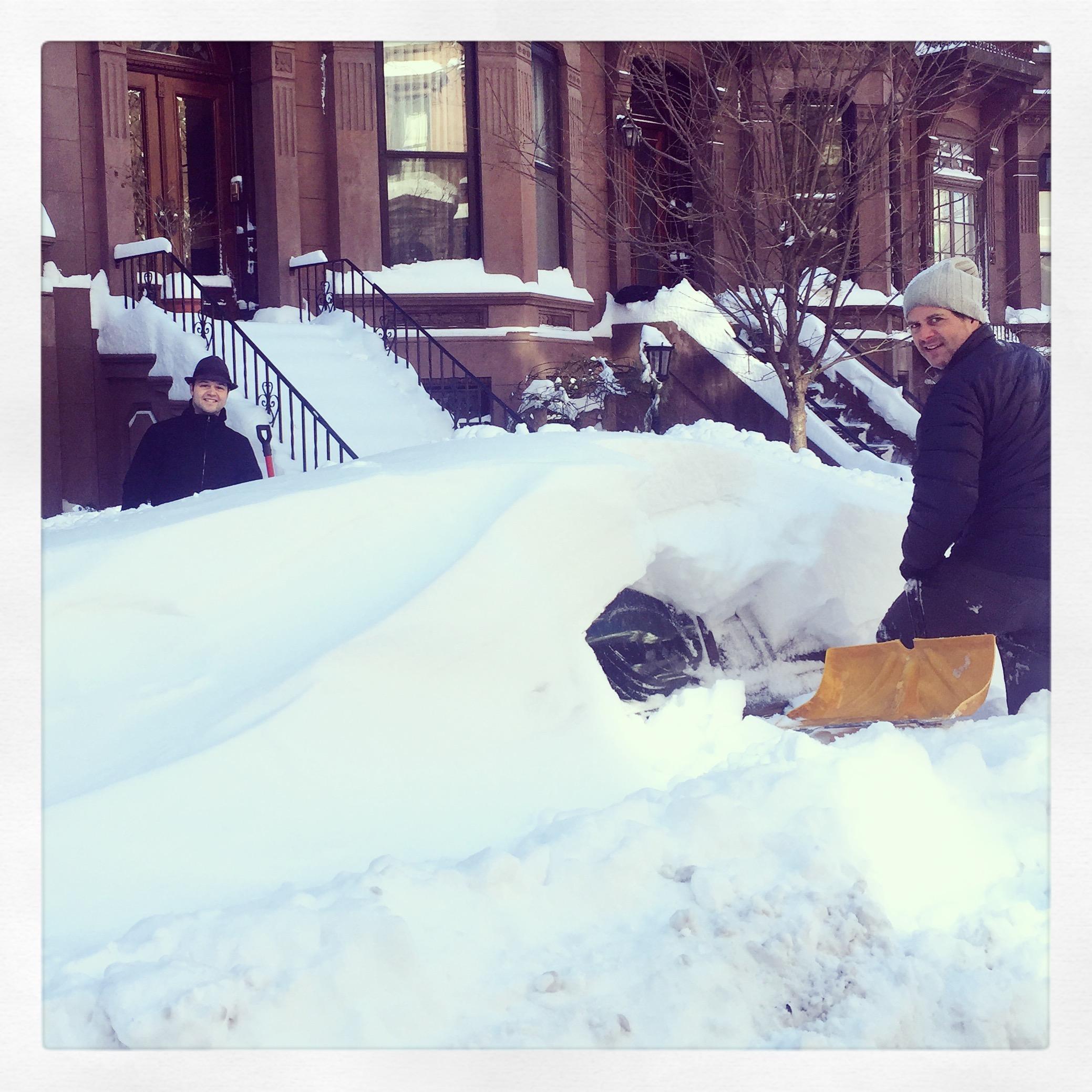 Epic winter dig out. That's our car under there!