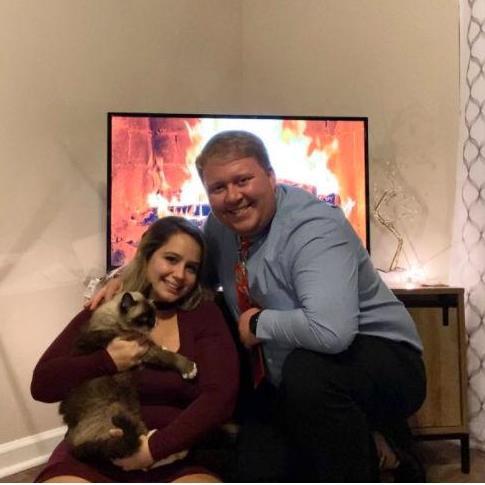 Celebrating Christmas in our first apartment together in Greenville, NC.
