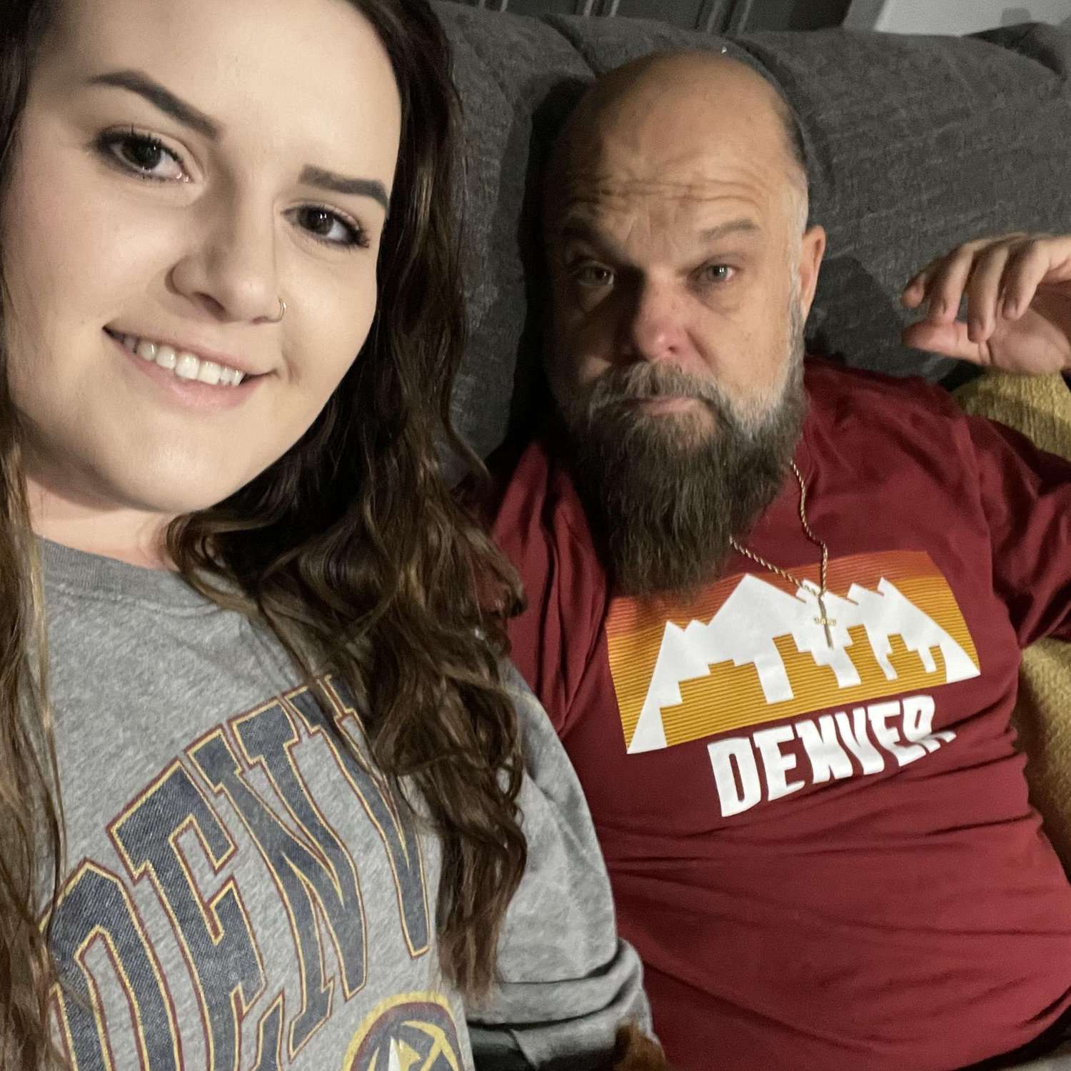 Lounging at home watching the Nuggets