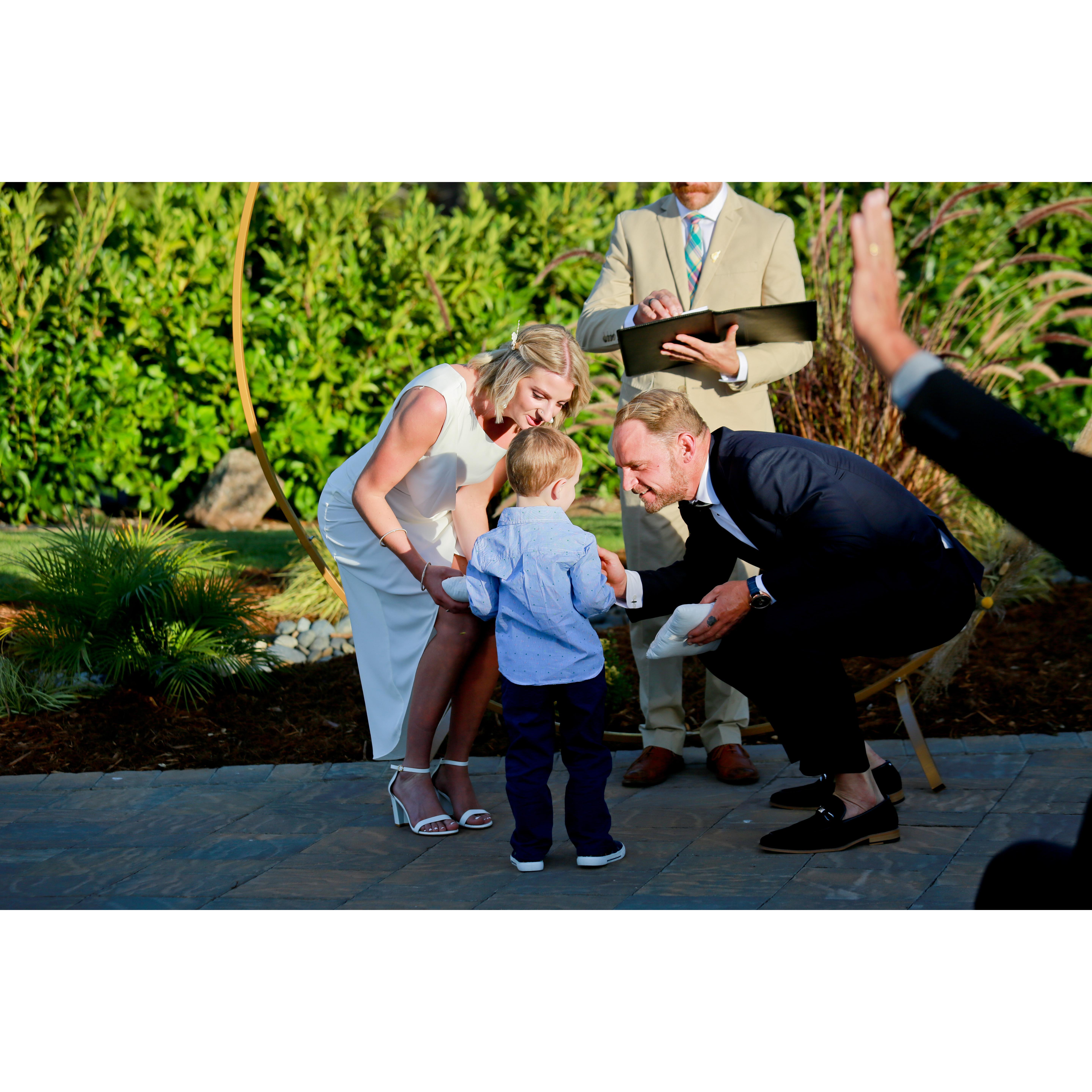 Connor brining Auntie Stephanie & Uncle Crizzle our wedding bands