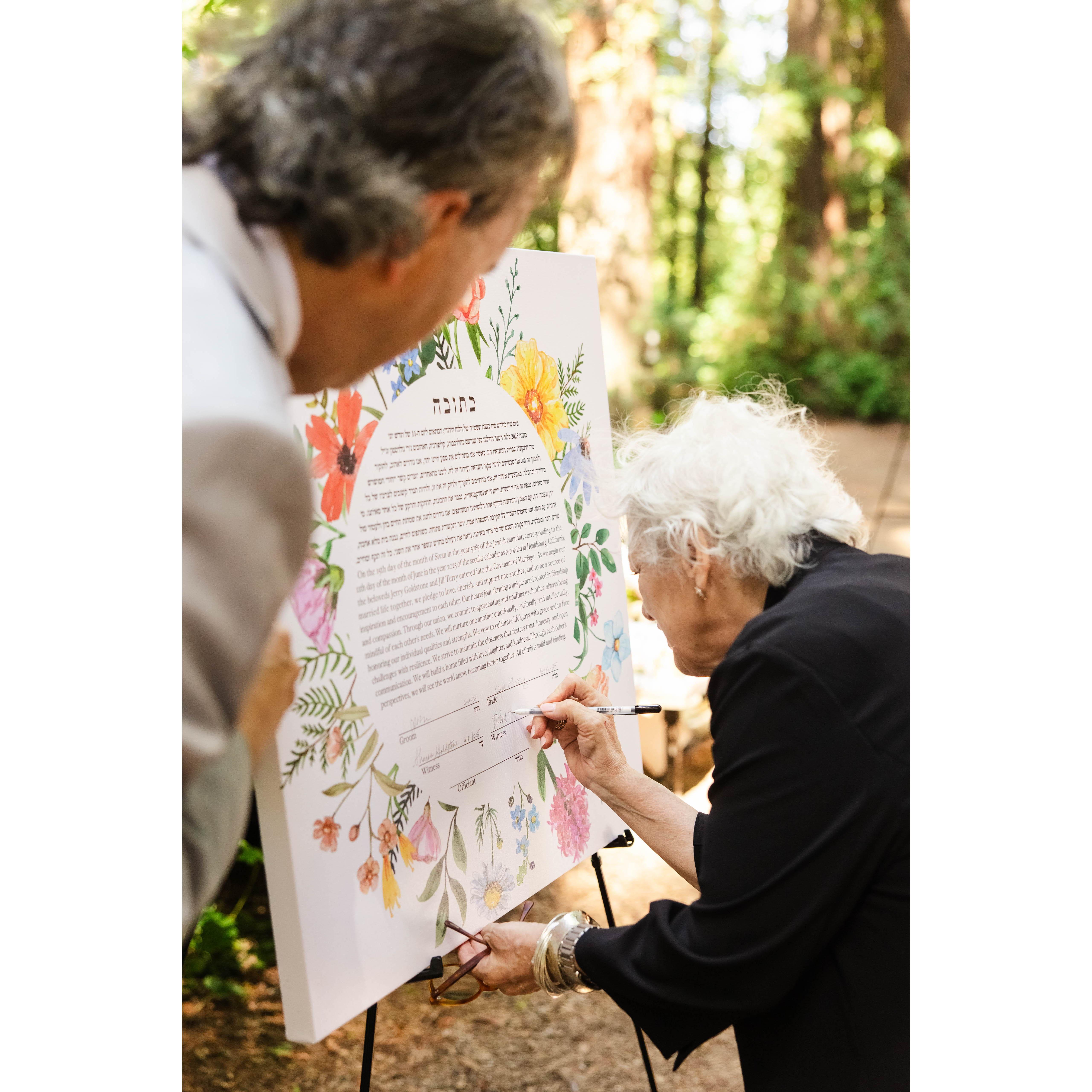Diane signs ketubah as witness