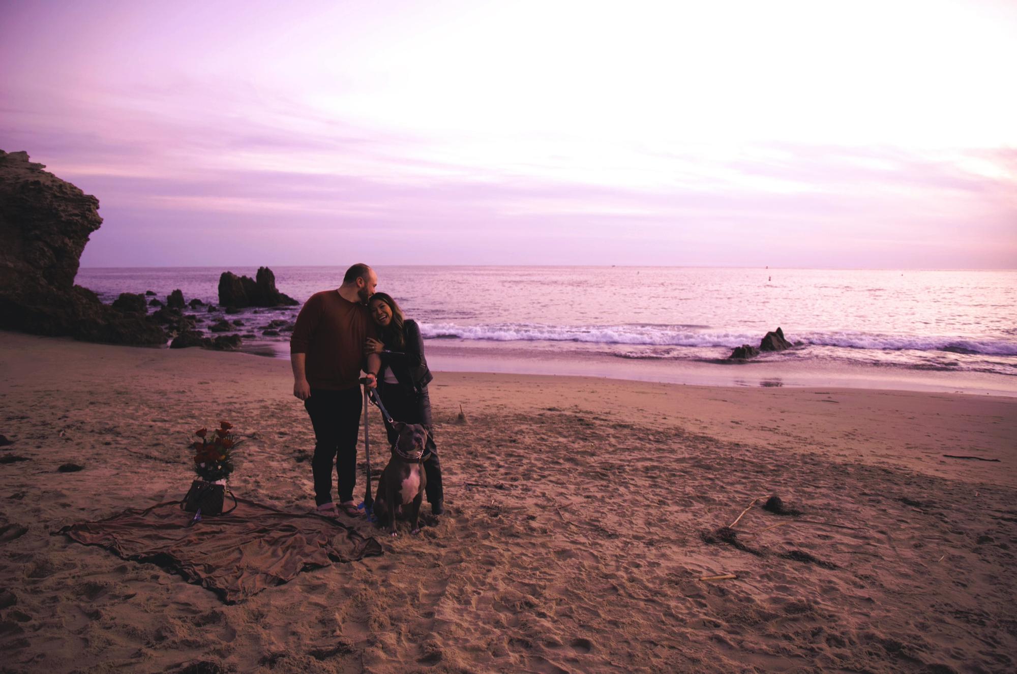 You can't see it, but Jax actually sat, smiled and behaved for one of the 200 pictures taken on Proposal Day.
January 8, 2022 -- Corona Del Mar, CA