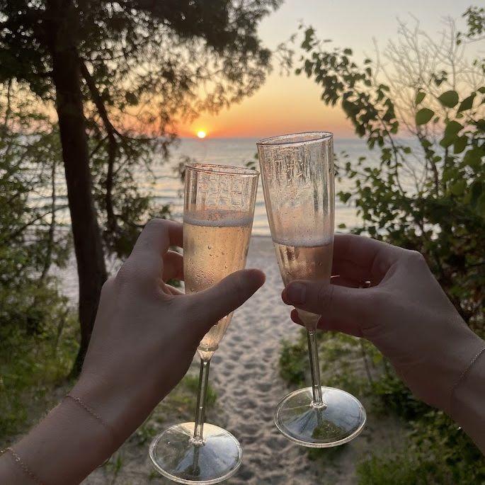 Second engagement cheers on the beach