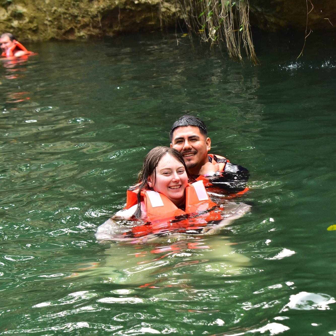 Chelsea has been swimming since she was two, Tavo told her on the first date he couldn't swim. This cenote was 300 feet deep.
