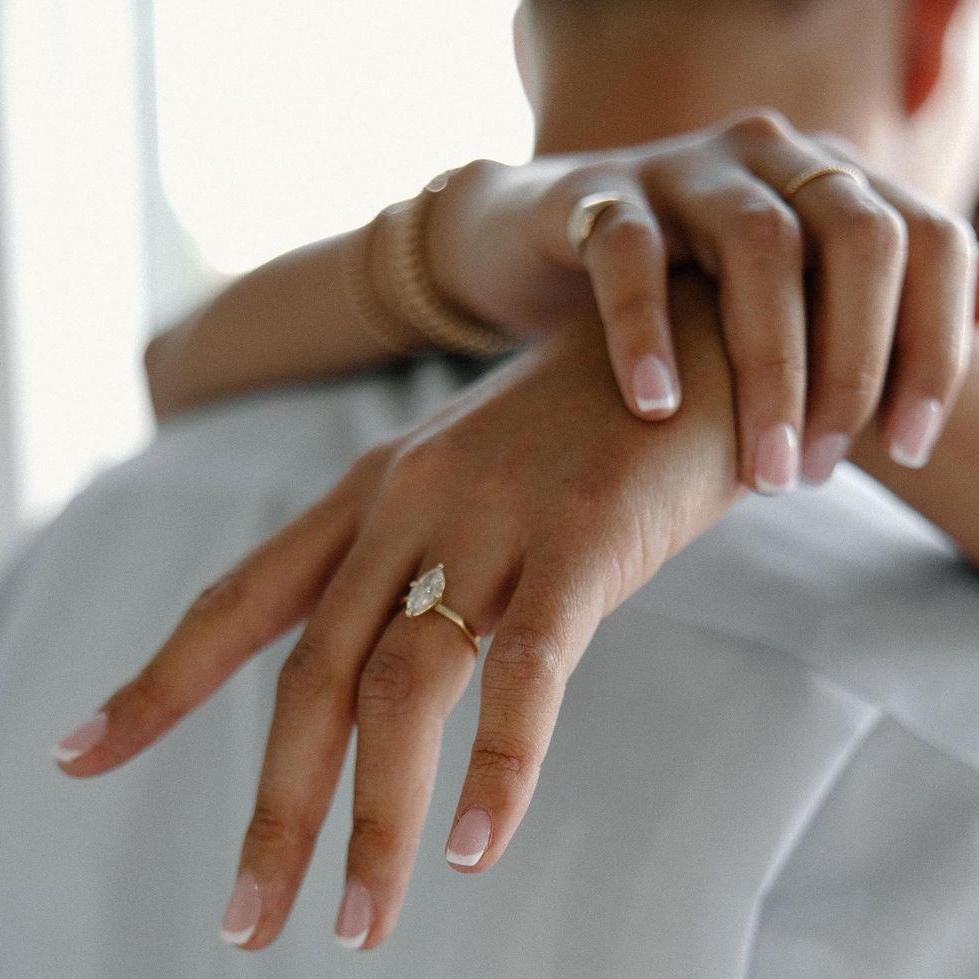 The engagement ring was designed and created by sweet Mary Brennan Reich, founder + owner of Bare and Golden (one of Lisa's favorite small businesses).