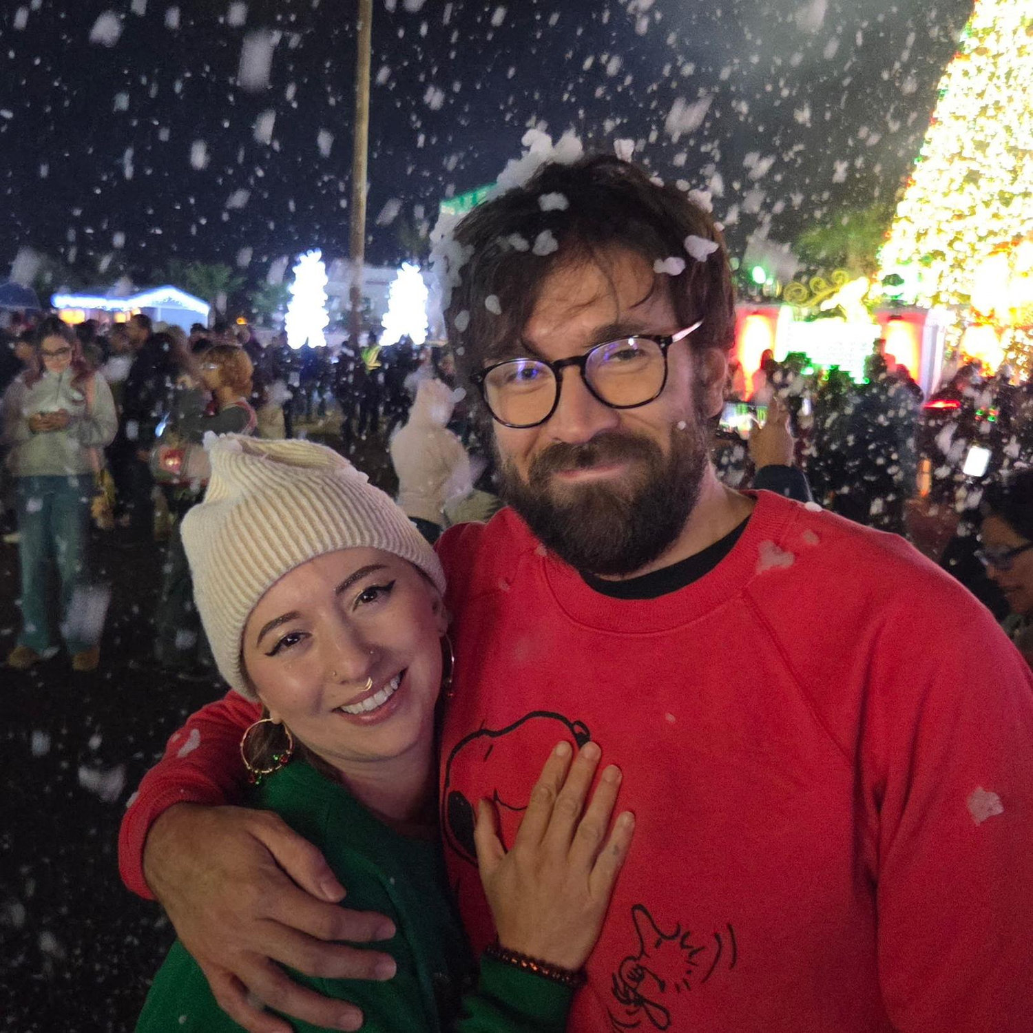 enjoying fake snow at the legendary Loya lightshow that local rich guy Fred Loya puts on at Christmas time