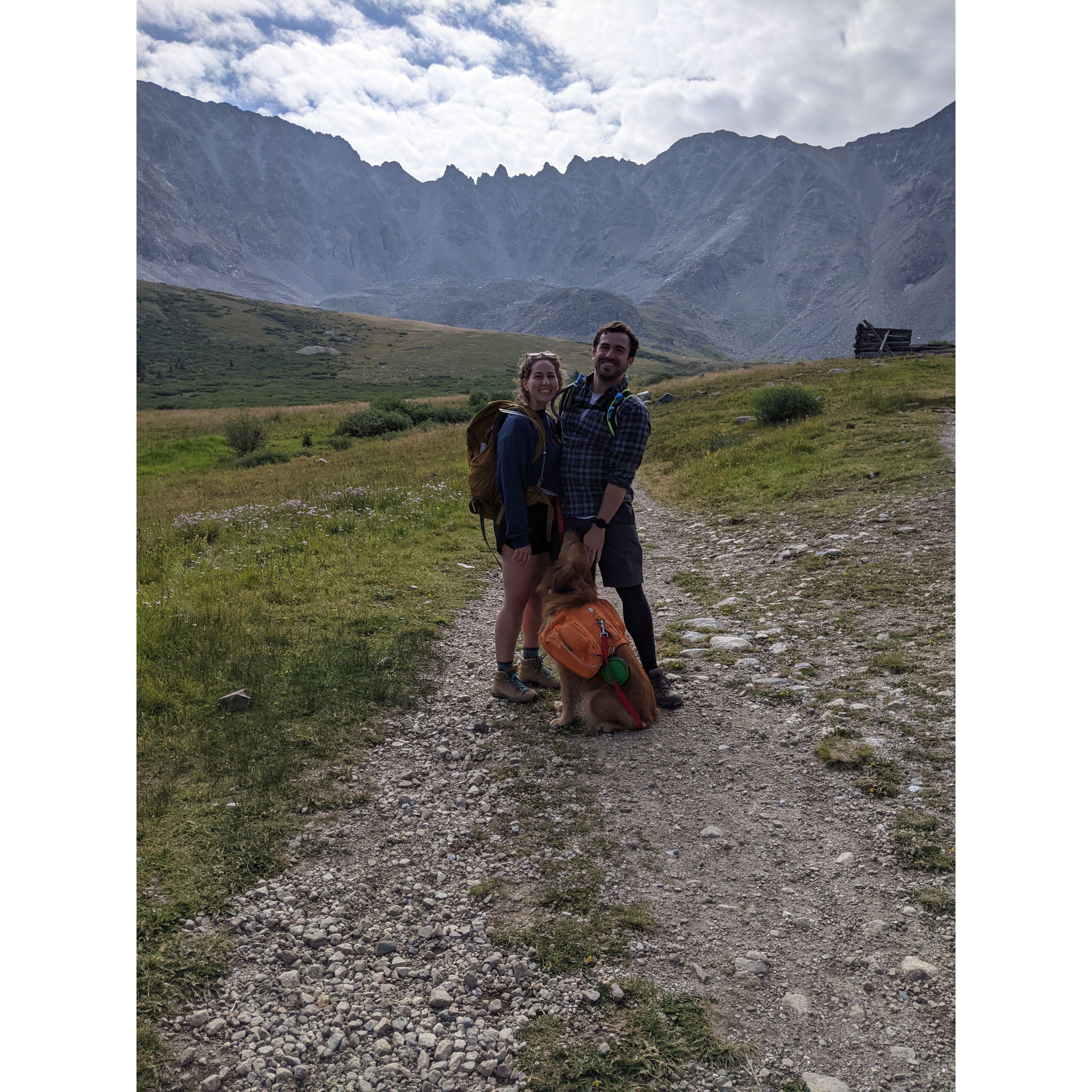 August 2021: Amanda and Leo hiking near Breckenridge CO and baby sitting Rusty Sontag