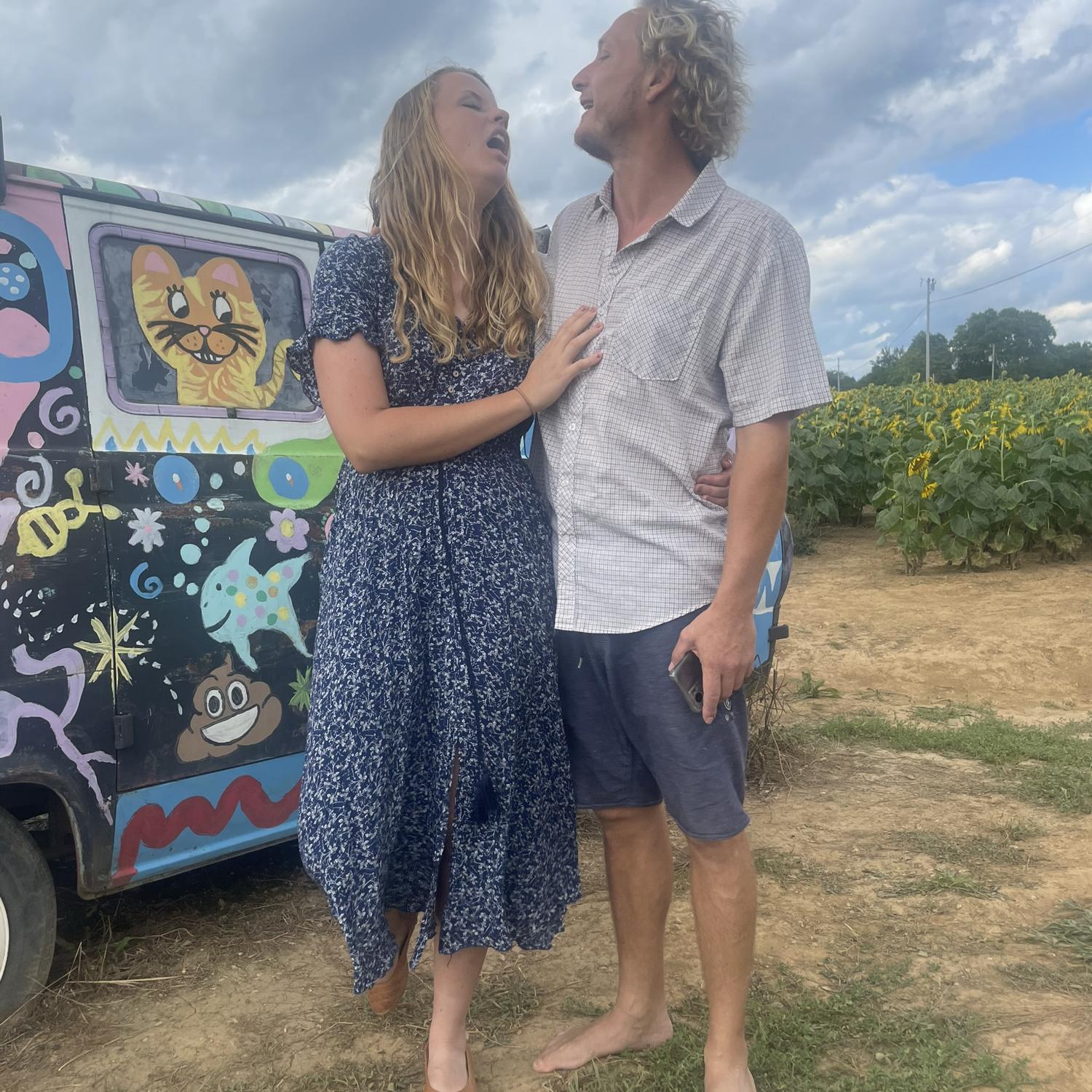 Checking out the sunflower fields and alien van.