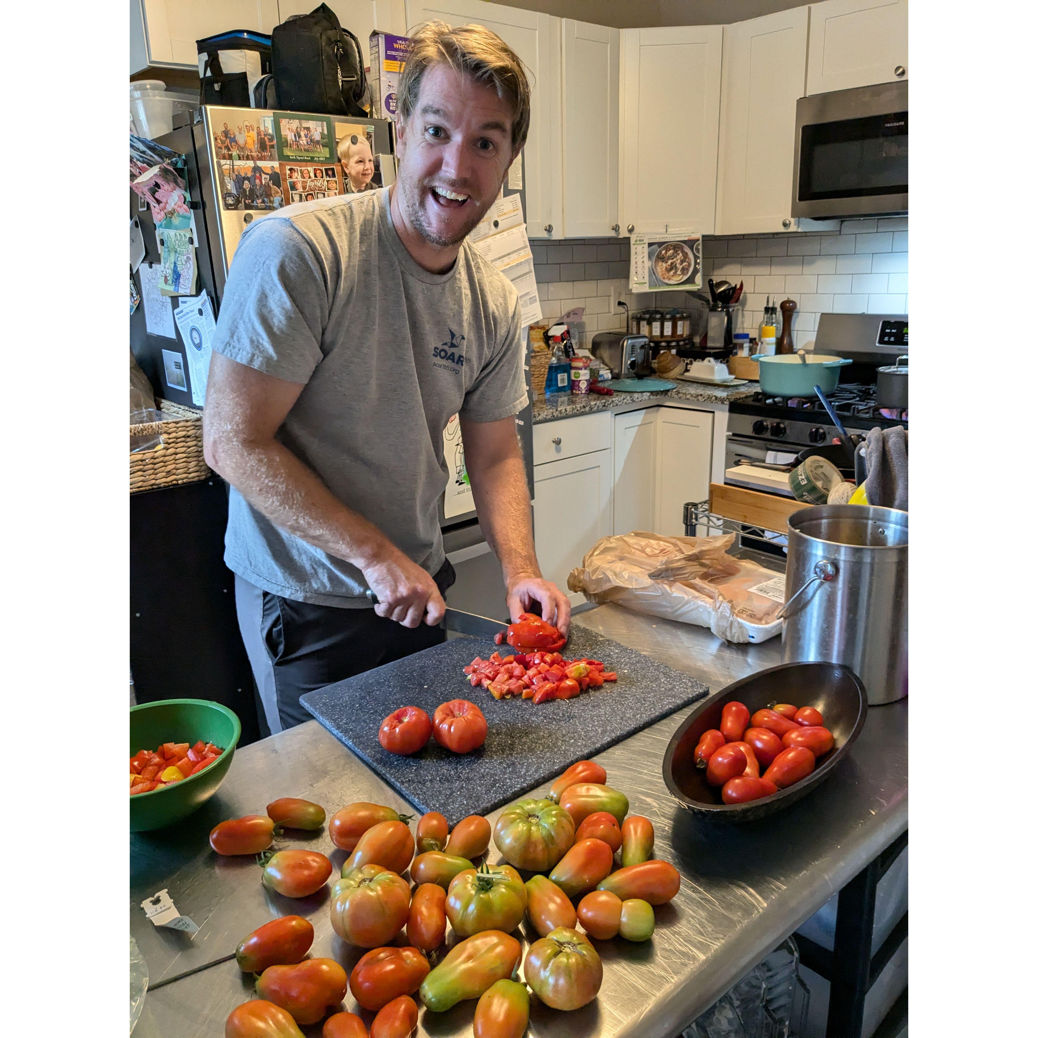 Chef Aaron chopping a bumper crop of home-grown garden tomatoes!