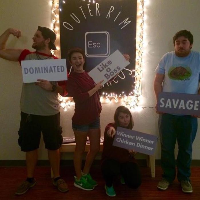 Julia & Stephen using their great teamwork to conquer an escape room with Allie and Dakota!
