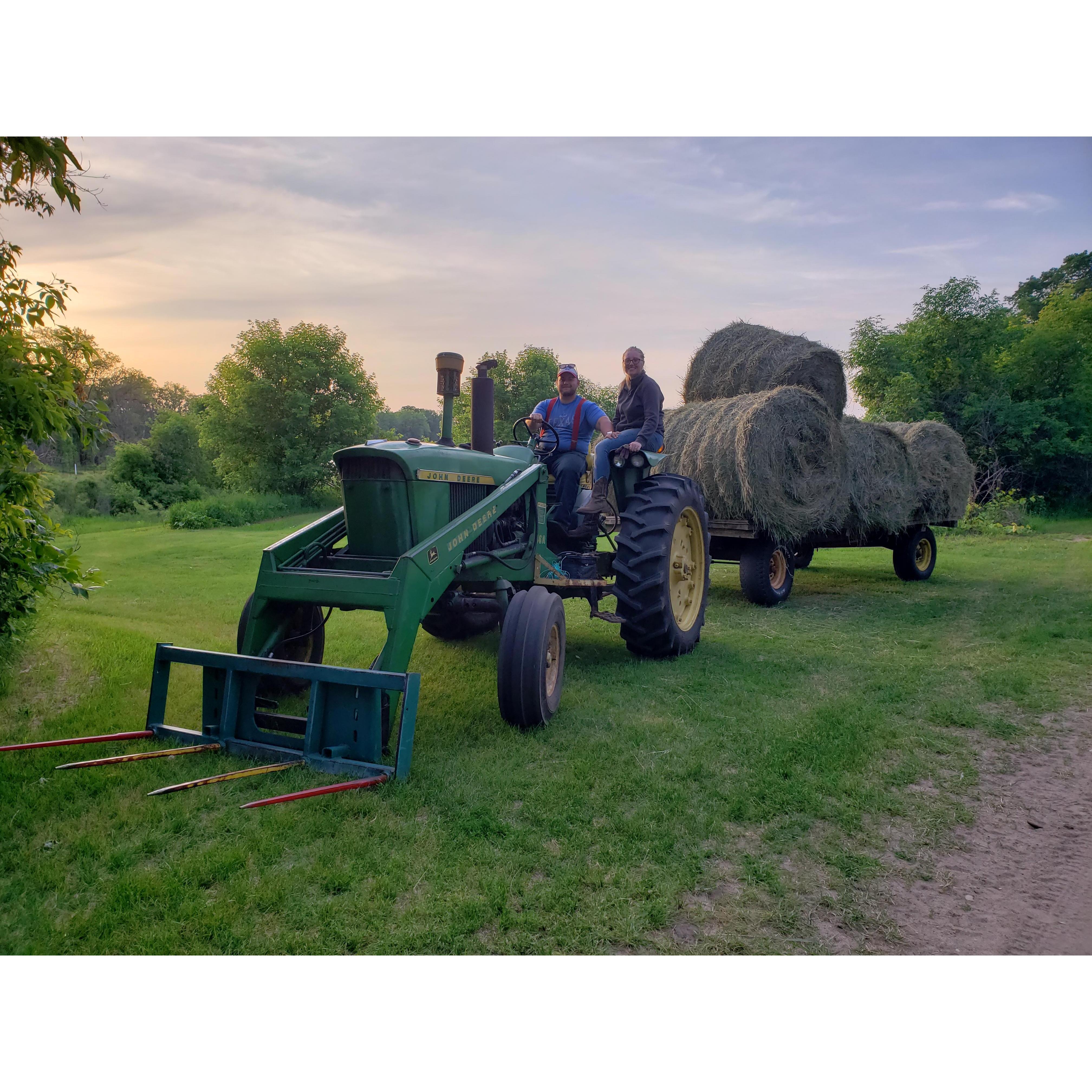 Moving bales one summer morning.