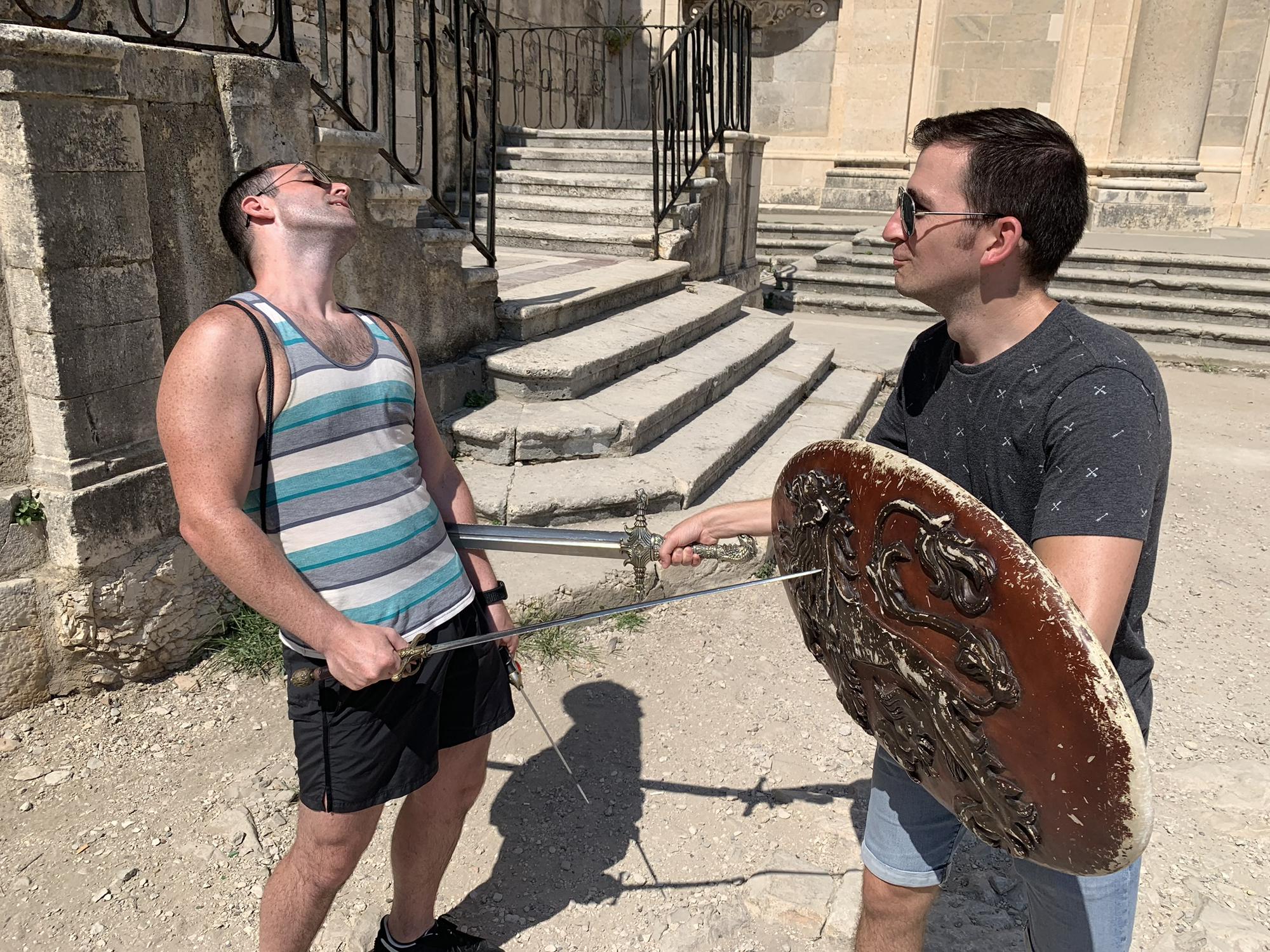 And sometimes we want to do this to each other... sword fighting with Game of Thrones props